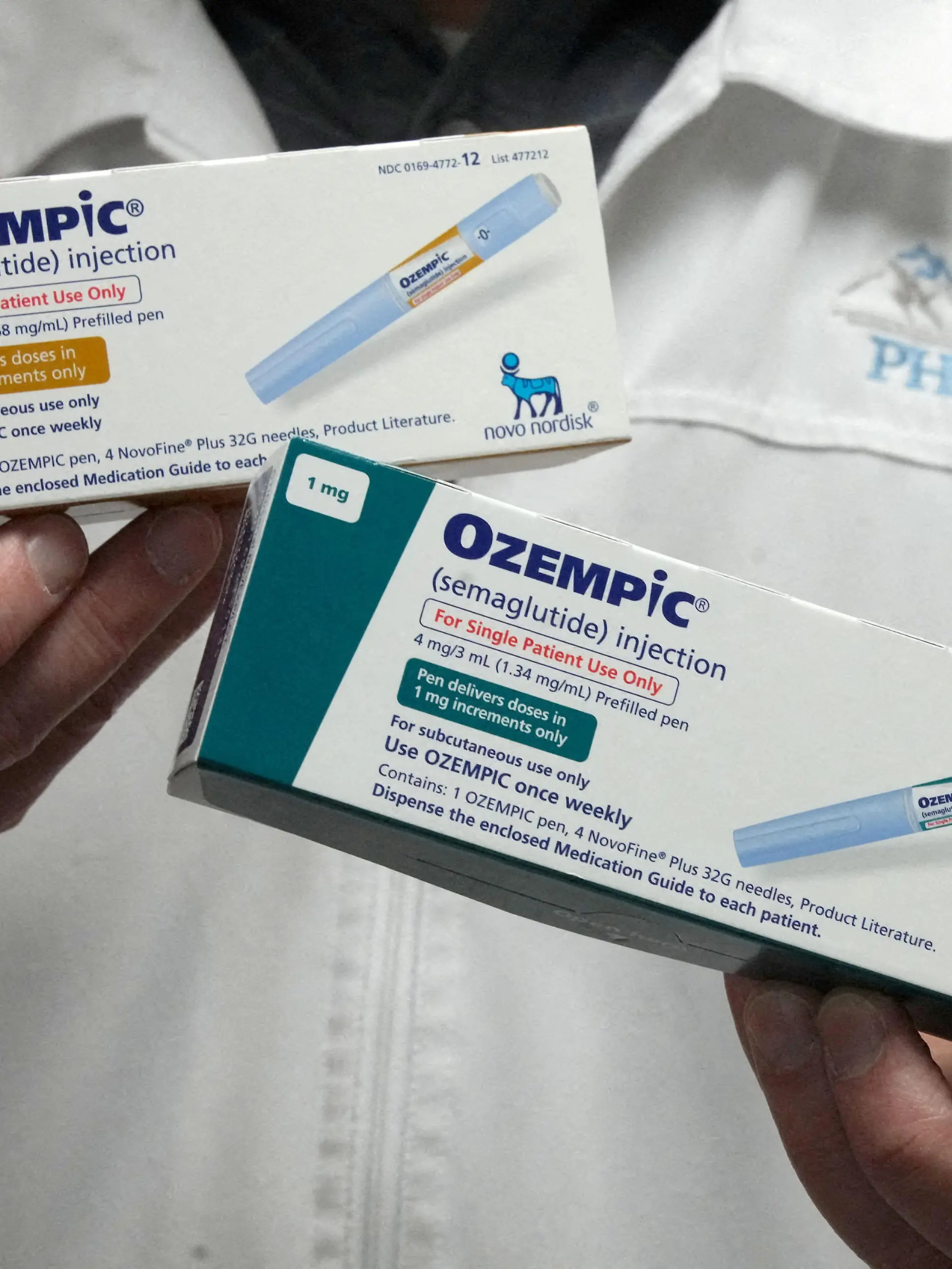 FILE PHOTO: A pharmacist displays boxes of Ozempic, a semaglutide injection drug used for treating type 2 diabetes and obesity made by Novo Nordisk, at Rock Canyon Pharmacy in Provo, Utah, U.S. March 29, 2023. REUTERS/George Frey/File Photo