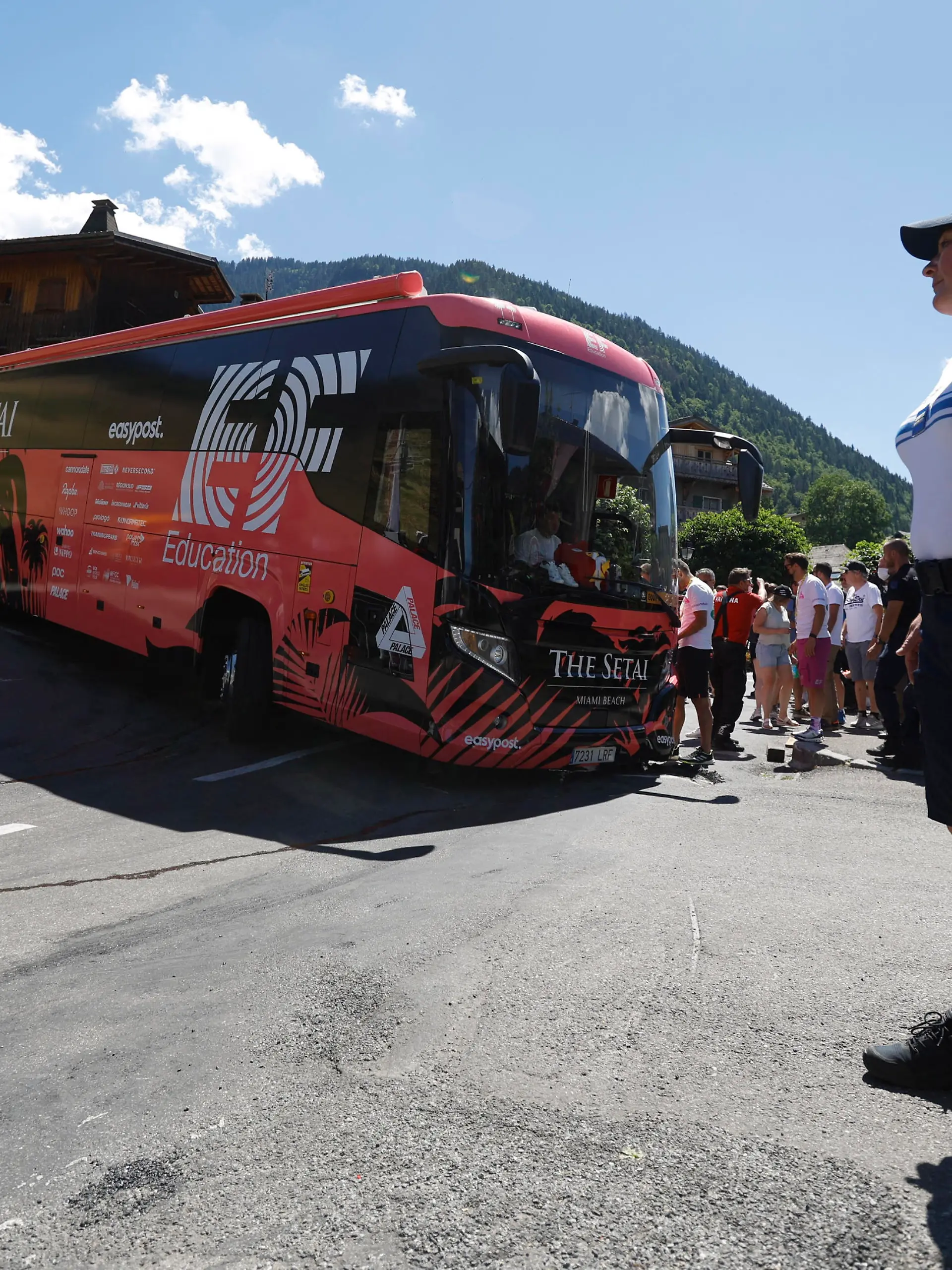 Cycling - Tour de France - Stage 10 - Morzine les Portes du Soleil to Megeve - France - July 12, 2022 EF Education-EasyPost bus team is pulled by a truck after getting stuck before stage 10 REUTERS/Gonzalo Fuentes