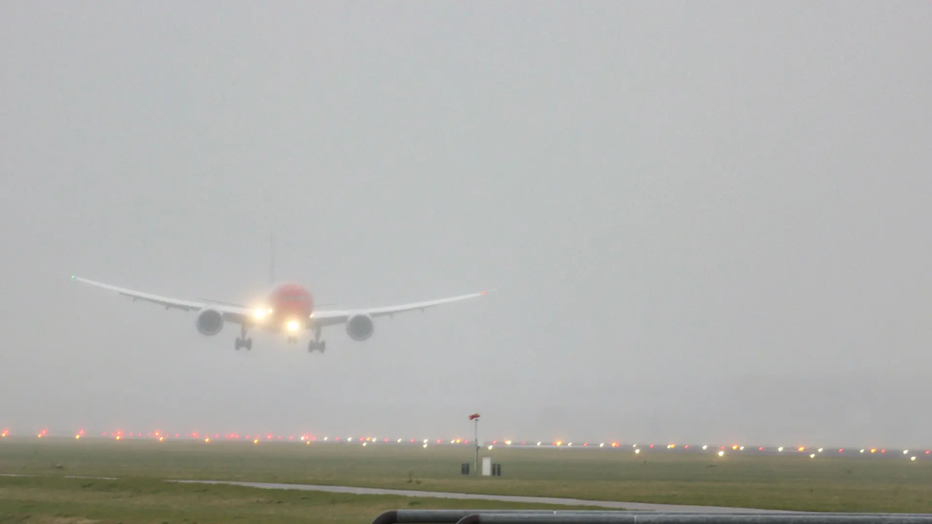 Norwegian Air Sweden Boeing 787-9 Dreamliner aircraft as seen on final approach landing on Polderbaan runway and taxiing at Amsterdam Schiphol International Airport AMS EHAM in The Netherlands during a rainy day in haze. The wide body commercial airplane has the registration SE-RXM, 2x RR Rolls Royce jet engines and the name Asger Jorn. Norwegian Air Sweden AB is a Swedish low-cost airline and a fully integrated subsidiary of Norwegian Air Shuttle, using its corporate identity. February 28, 2020 (Photo by Nicolas Economou/NurPhoto)