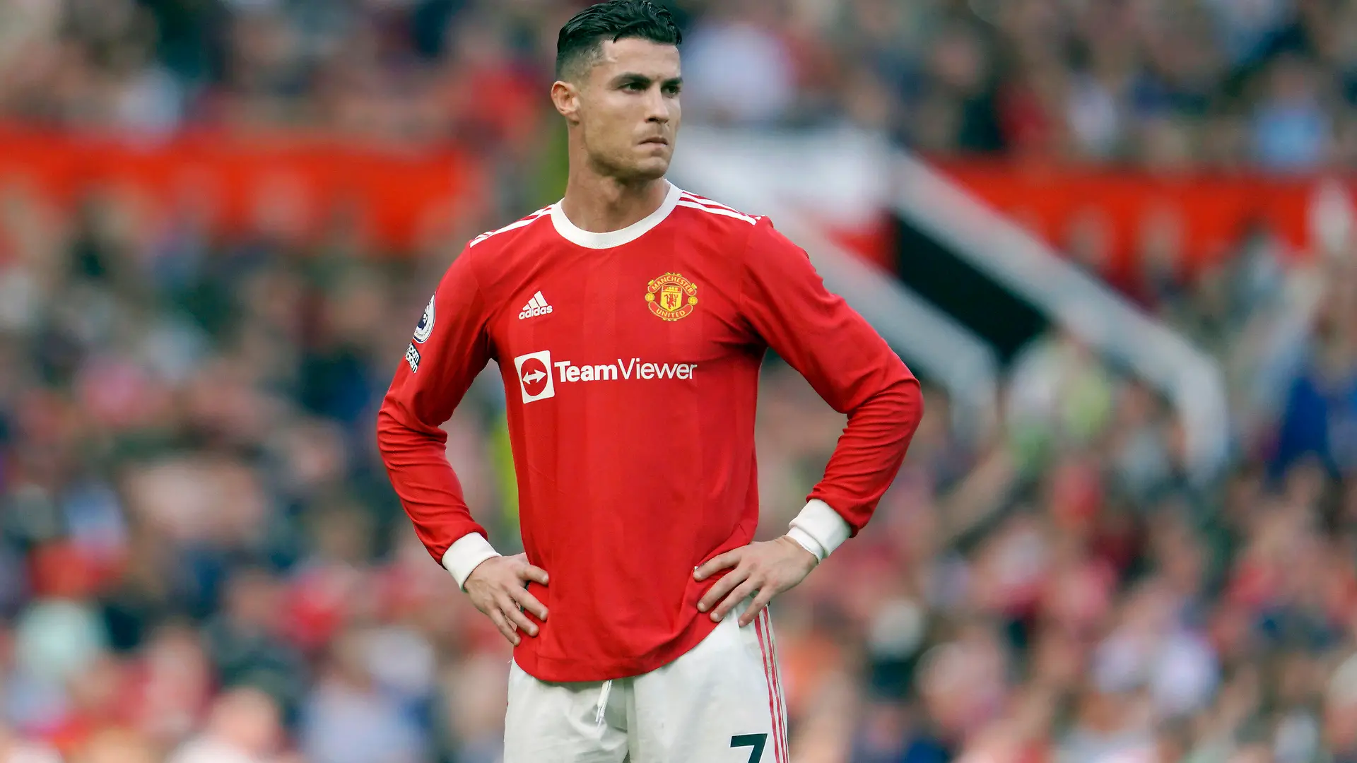 FILE- Manchester United's Cristiano Ronaldo stands on the pitch during the English Premier League soccer match between Manchester United and Norwich City at Old Trafford stadium in Manchester, England, on April 16, 2022. A Nevada woman has lost her bid in a U.S. court to force international soccer star Cristiano Ronaldo to pay millions of dollars more than the $375,000 in hush money she received after claiming he raped her in Las Vegas in 2009. (AP Photo/Jon Super, File)