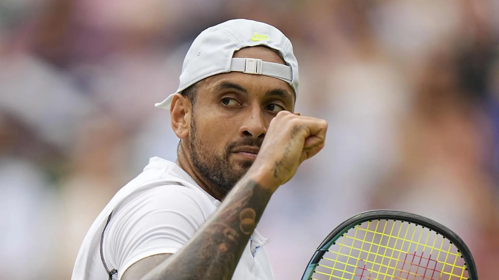 Australia's Nick Kyrgios reacts after winning a point during his quarterfinal match against Cristian Garin of Chile at the Wimbledon tennis championships in London on July 6, 2022. (Kyodo)
==Kyodo
/ action press