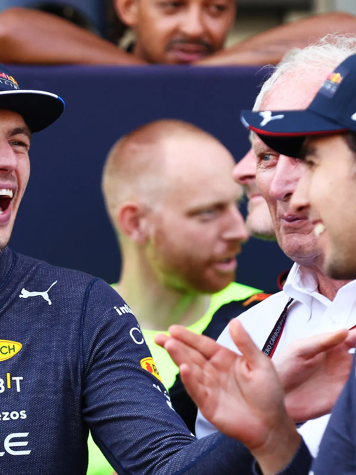 BAKU, AZERBAIJAN - JUNE 12: Race winner Max Verstappen of the Netherlands and Oracle Red Bull Racing and Second placed Sergio Perez of Mexico and Oracle Red Bull Racing talk after the F1 Grand Prix of Azerbaijan at Baku City Circuit on June 12, 2022 in Baku, Azerbaijan. (Photo by Clive Rose/Getty Images)
