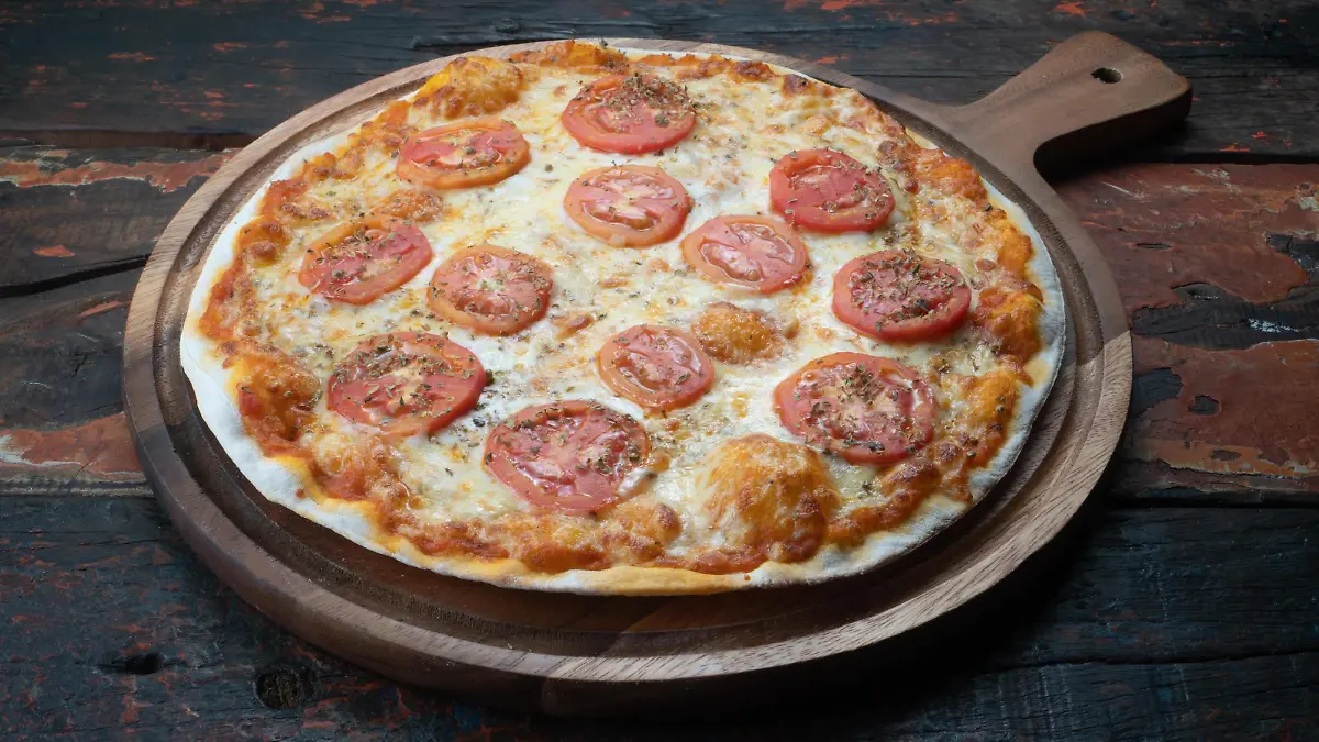  Pizza Margarita on rustic wooden background Copyright: xstryjekx Panthermedia27389256