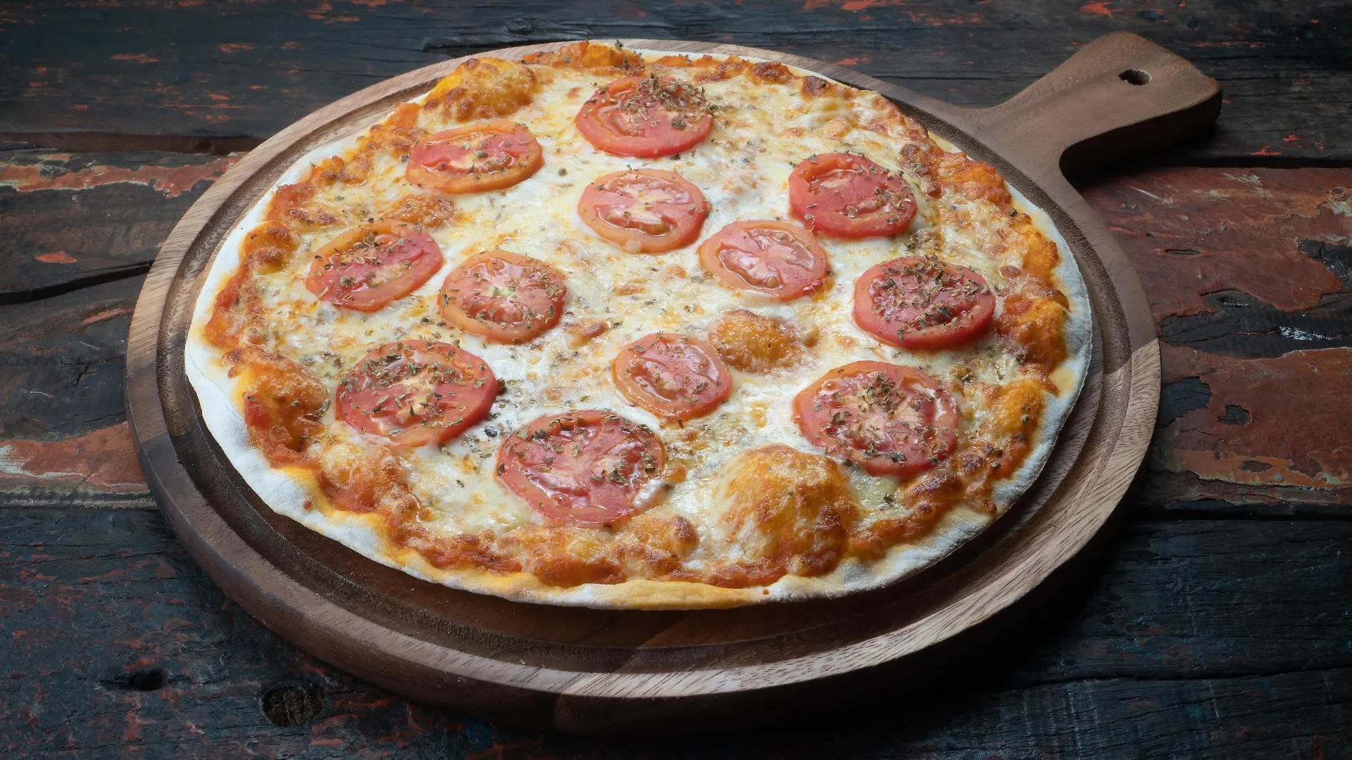 Pizza Margarita on rustic wooden background Copyright: xstryjekx Panthermedia27389256