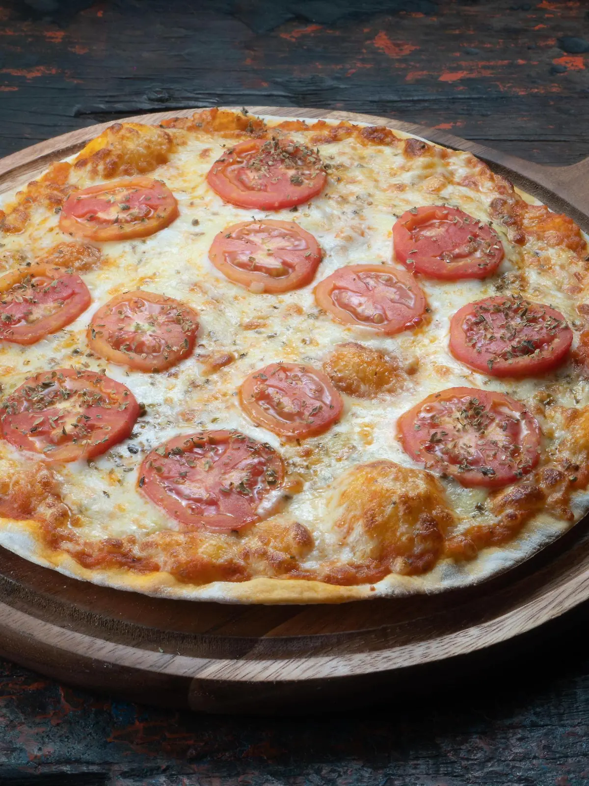  Pizza Margarita on rustic wooden background Copyright: xstryjekx Panthermedia27389256
