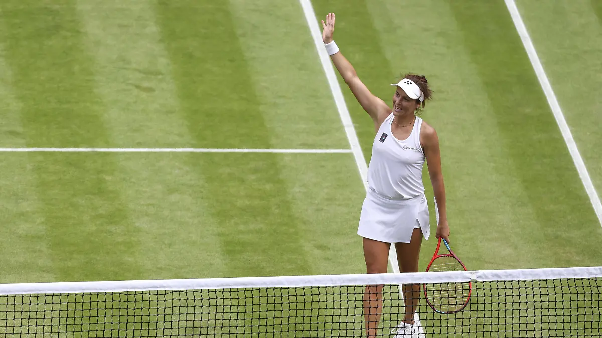 (220706) -- LONDON, July 6, 2022 (Xinhua) -- Tatjana Maria of Germany celebrates after winning the women's singles quarter-final match against her compatriot Jule Niemeier at Wimbledon Tennis Championship in London, Britain, on July 5, 2022. (Xinhua/Han Yan) - Han Yan -//CHINENOUVELLE_08500110/2207060904/Credit:CHINE NOUVELLE/SIPA/2207060923 / action press
