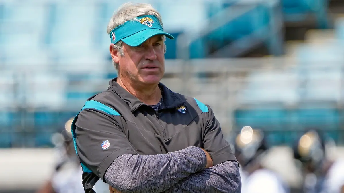 FILE - Jacksonville Jaguars head coach Doug Pederson watches players run through drills during an NFL football practice, Monday, June 5, 2023, in Jacksonville, Fla. Jacksonville Jaguars coach Doug Pederson’s son is the team’s newest tight end. The Jaguars signed Josh Pederson on Monday, July 10, 2023, bringing him aboard nearly a month after he finished the USFL season with the Houston Gamblers. (AP Photo/John Raoux, File)
