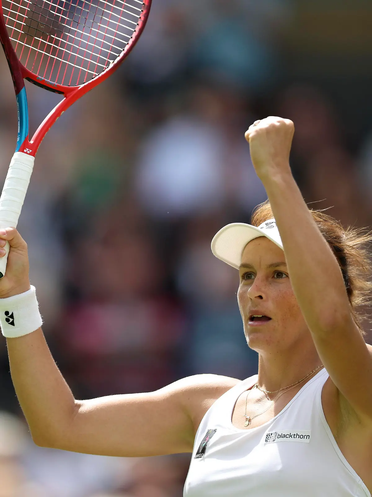  220706 -- LONDON, July 6, 2022 -- Tatjana Maria of Germany celebrates during the women s singles quarter-final match against her compatriot Jule Niemeier at Wimbledon Tennis Championship in London, Britain, on July 5, 2022.  SPBRITAIN-LONDON-TENNIS-WIMBLEDON-WOMEN S SINGLES-QUARTERFINALS HanxYan PUBLICATIONxNOTxINxCHN