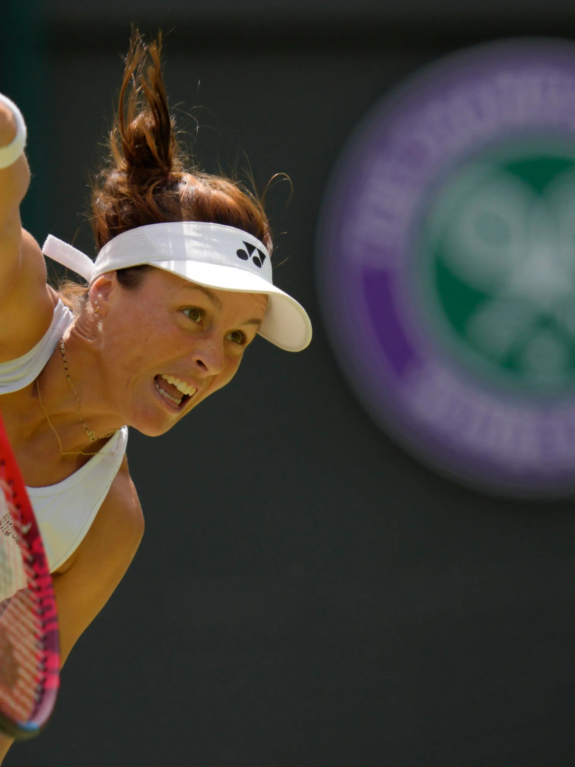 Germany's Tatjana Maria serves to Germany's Jule Niemeier in a women's singles quarterfinal match at the Wimbledon tennis championships in London, Tuesday July 5, 2022. (AP Photo/Kirsty Wigglesworth)