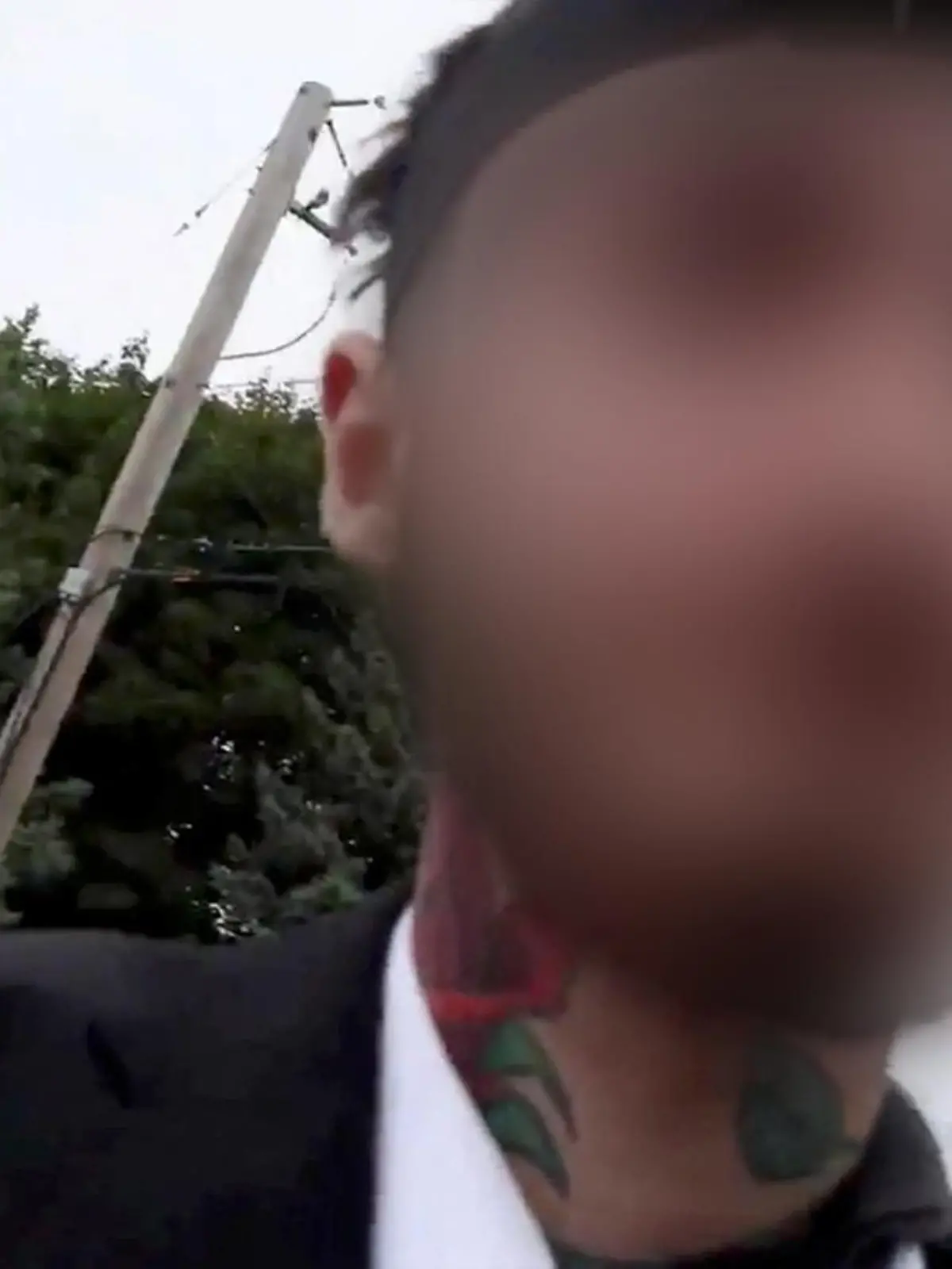 Robert (Bob) E. Crimo III, a person of interest in the mass shooting that took place at a Fourth of July parade route in the wealthy Chicago suburb of Highland Park, Illinois, U.S. is seen in this still image obtained from a social media video