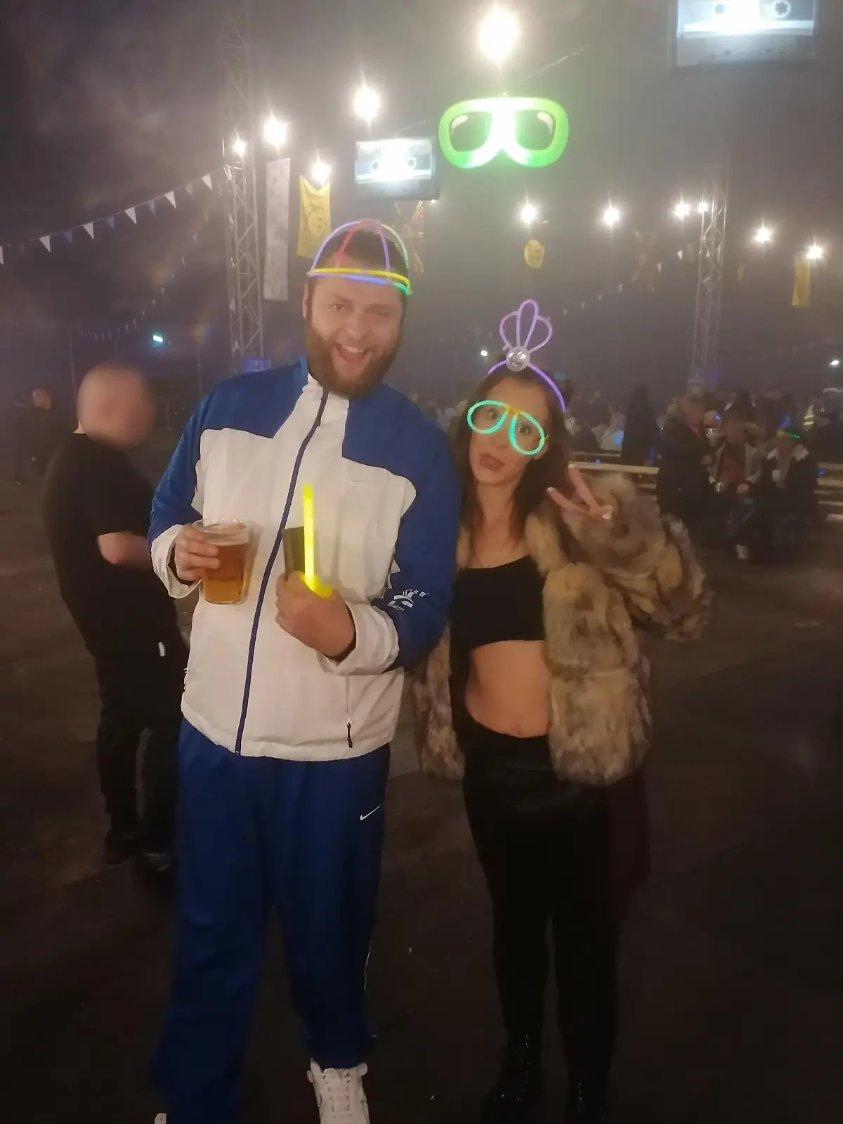 PIC FROM Kennedy News and Media (PICTURED: STACEY GRIMES, 33, WITH HER PARTNER NATHAN NEWMAN, 34, AT THE MUSIC FESTIVAL LAST OCTOBER) A mum almost lost her leg after being bitten by a spider at a music festival - leaving her with a wound that became so infected doctors had to cut out a chunk of it while she was awake. Stacey Grimes, from Southend-on-Sea, Essex, claims she had been to The Big 90s Festival in Southend, Essex, with her partner, in October last year, before a mark appeared on her lower right leg. The 33-year-old assumed she must have banged her leg and not realised, mistaking the mark for a bruise. DISCLAIMER: While Kennedy News and Media uses its best endeavours to establish the copyright and authenticity of all pictures supplied, it accepts no liability for any damage, loss or legal action caused by the use of images supplied and the publication of images is solely at your discretion. SEE KENNEDY NEWS COPY - 0161 697 4266