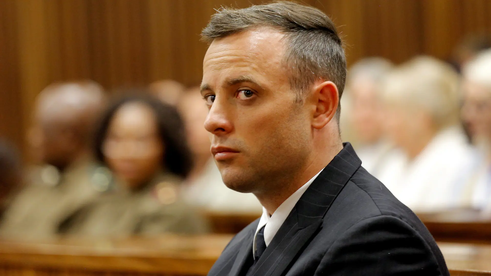 FILE PHOTO: Former Paralympian Oscar Pistorius appears for sentencing for the murder of Reeva Steenkamp at the Pretoria High Court, South Africa June 14, 2016. REUTERS/Kim Ludbrook/Pool/File Photo