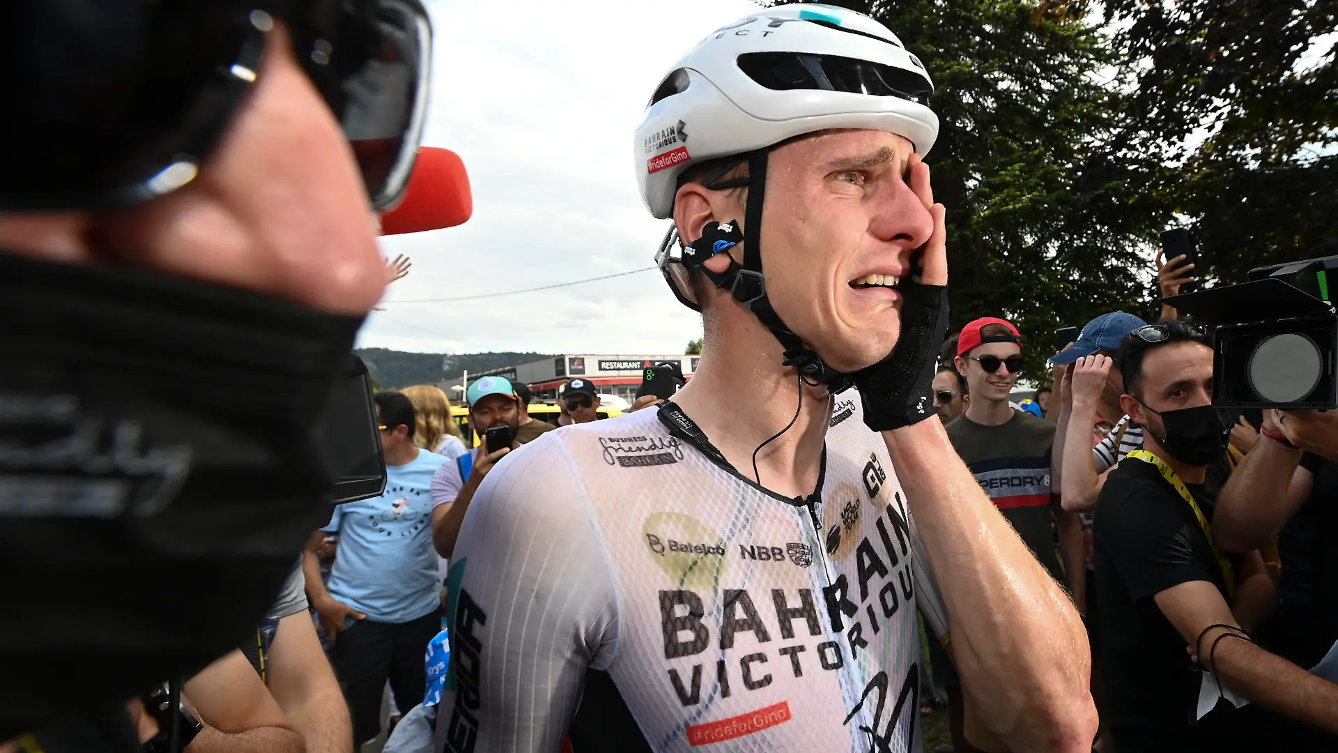 Stage winner Slovenia's Matej Mohoric cries after the nineteenth stage of the Tour de France cycling race over 173 kilometers (107.5 miles) with start in Moirans-en-Montagne and finish in Poligny, France, Friday, July 21, 2023. (Tim De Waele/Pool Photo via AP)