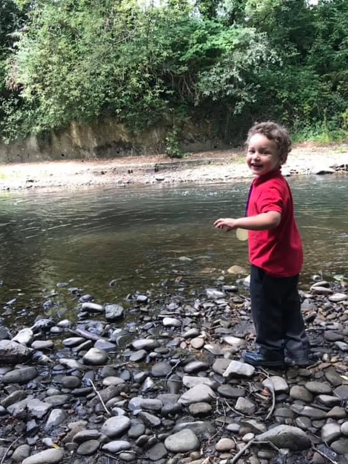 Pictured: The five year old who died in Ogmore river, named locally as Logan Williamson, pictured by Ogmore river on July 2019.
Re: South Wales Police can confirm that  three people have been arrested following reports of concerns for a missing 5 year old boy in Sarn, Bridgend, and the subsequent finding of the body in the Ogmore River near Pandy Park, Bridgend, Wales, UK.
A 39 year male, 30 year female and 13 year old male, all from the Bridgend area, have been arrested on suspicion of murder and are currently in police custody.  We are not looking for anyone else in relation to this incident.