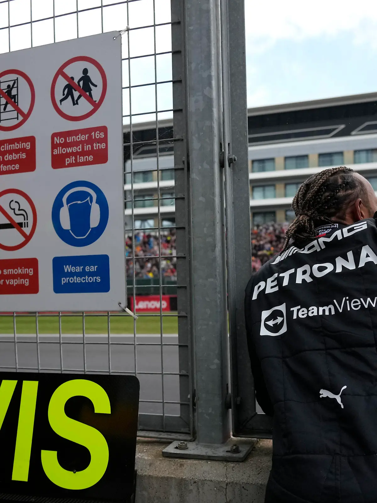 Mercedes driver Lewis Hamilton of Britain waves to fans during the first free practice at the Silverstone circuit, in Silverstone, England, Friday, July 1, 2022. The British F1 Grand Prix is held on Sunday July 3, 2022. (AP Photo/Matt Dunham)