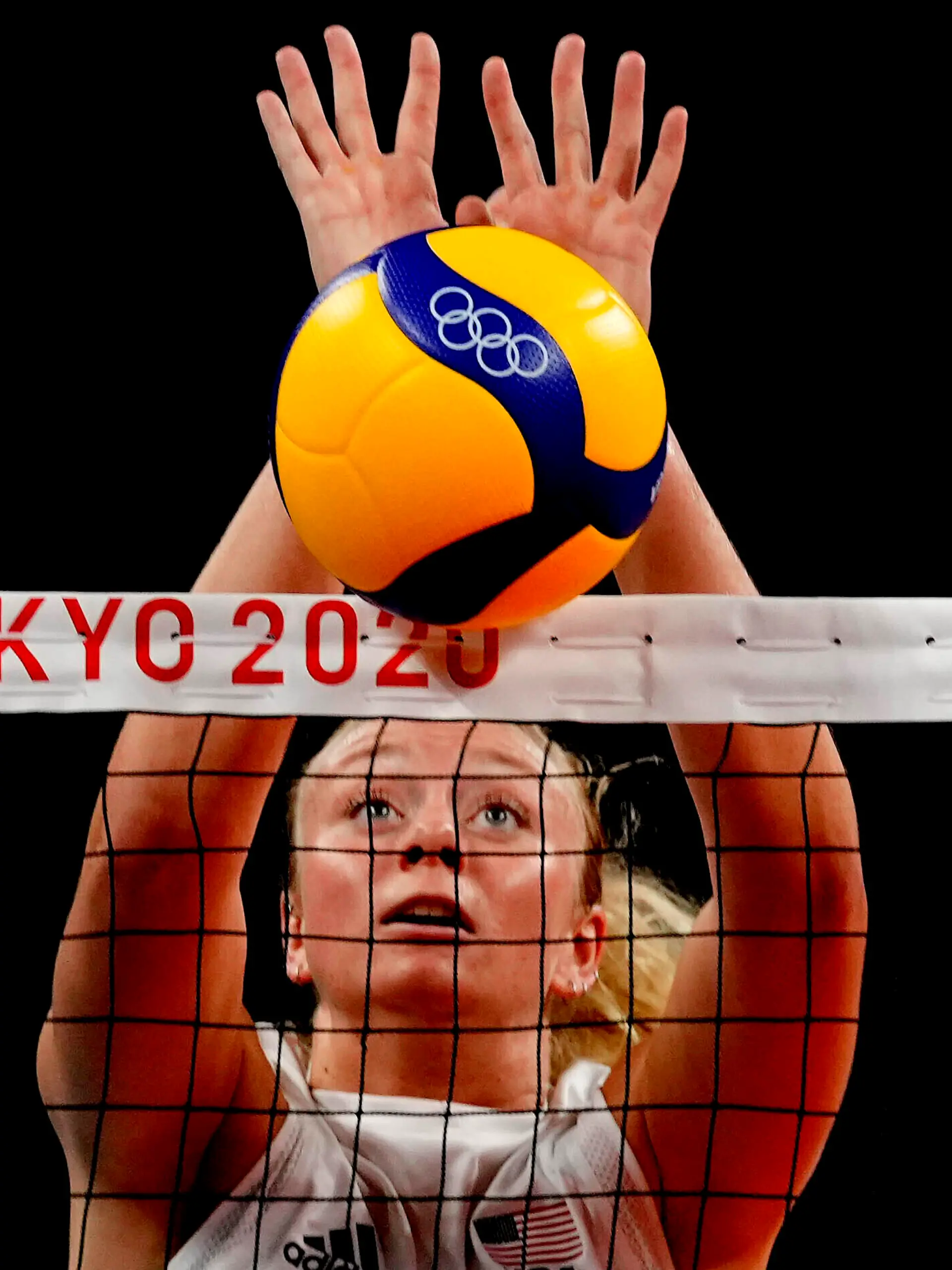 FILE - United States' Jordyn Poulter blocks the ball during the women's volleyball preliminary round at the 2020 Summer Olympics, July 27, 2021, in Tokyo. A stolen Olympic gold medal belonging to Poulter has been found in Southern California, authorities said Wednesday, June 29. Poulter reported the medal stolen May 25 after the Olympian discovered her car broken into at a parking garage in Anaheim, Calif., police said. (AP Photo/Frank Augstein,File)