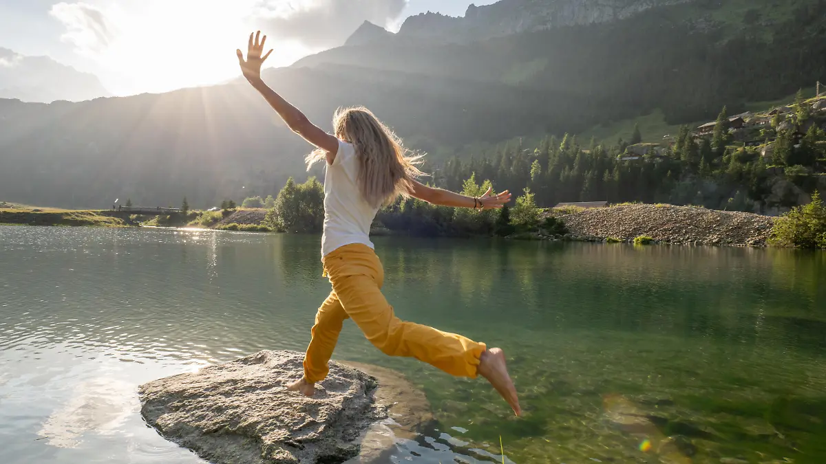 She plays in nature and enjoys the freedom. Uri/ Graubunden canton, Switzerland