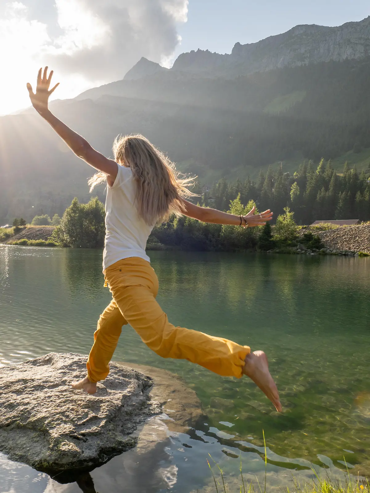 She plays in nature and enjoys the freedom. Uri/ Graubunden canton, Switzerland