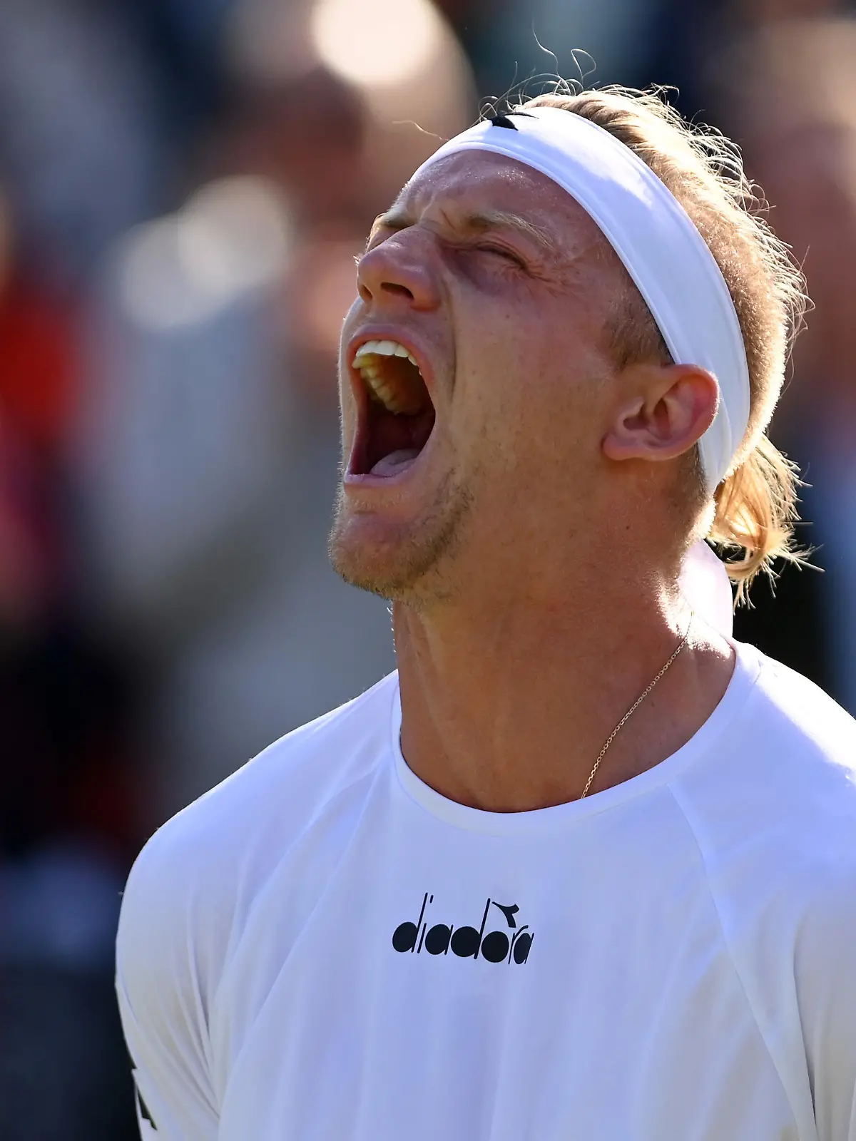 LONDON, ENGLAND - JUNE 27: Alejandro Davidovich Fokina of Spain celebrates winning match point against Hubert Hurkacz of Poland during the Men's Singles First Round match during Day One of The Championships Wimbledon 2022 at All England Lawn Tennis and Croquet Club on June 27, 2022 in London, England. (Photo by Justin Setterfield/Getty Images)