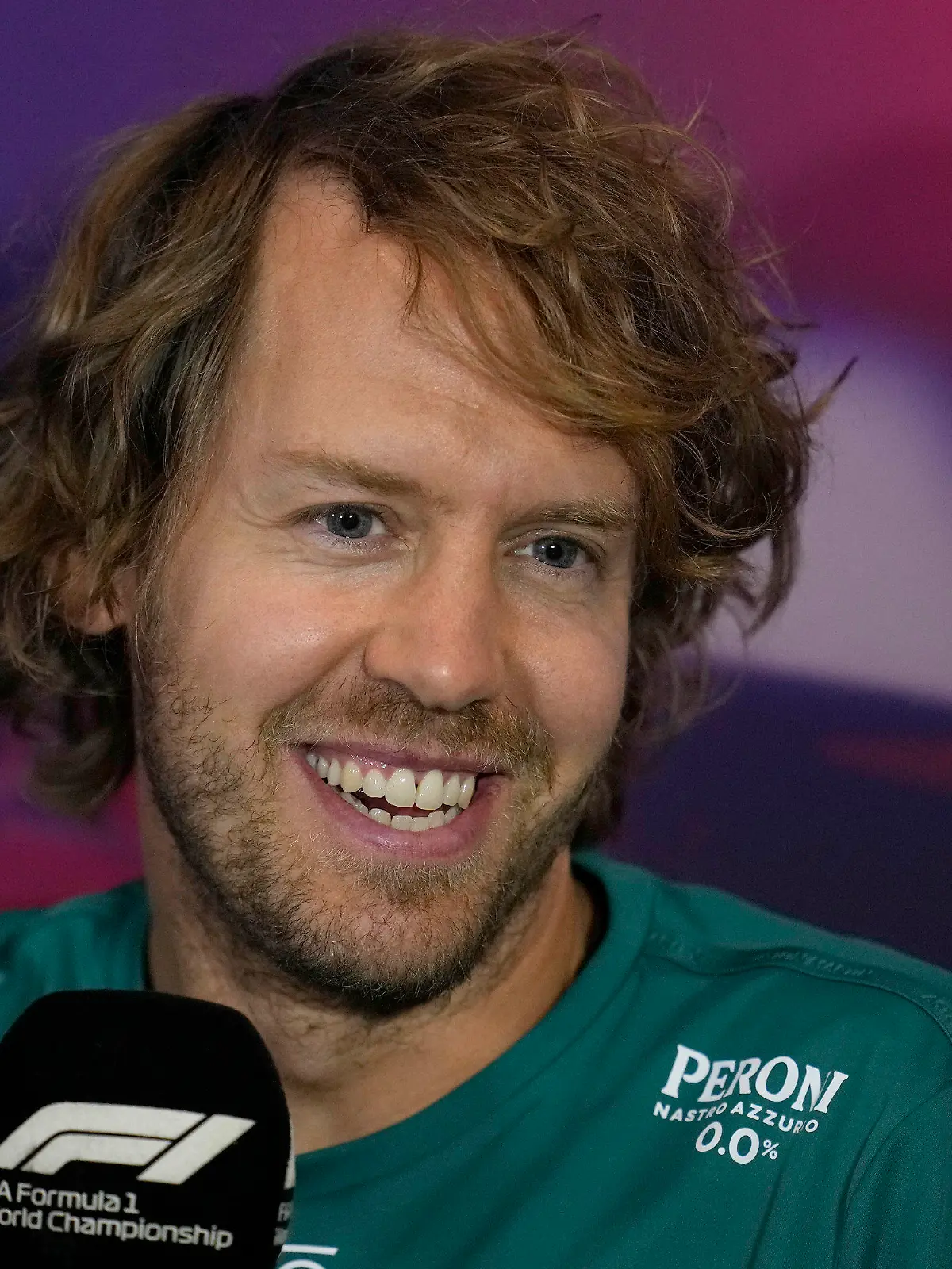 Aston Martin driver Sebastian Vettel of Germany smiles during a press conference at the Silverstone race track in Silverstone, Thursday, June 30, 2022. The British F1 Grand Prix is held on Sunday July 3,2022. (AP Photo/Matt Dunham)