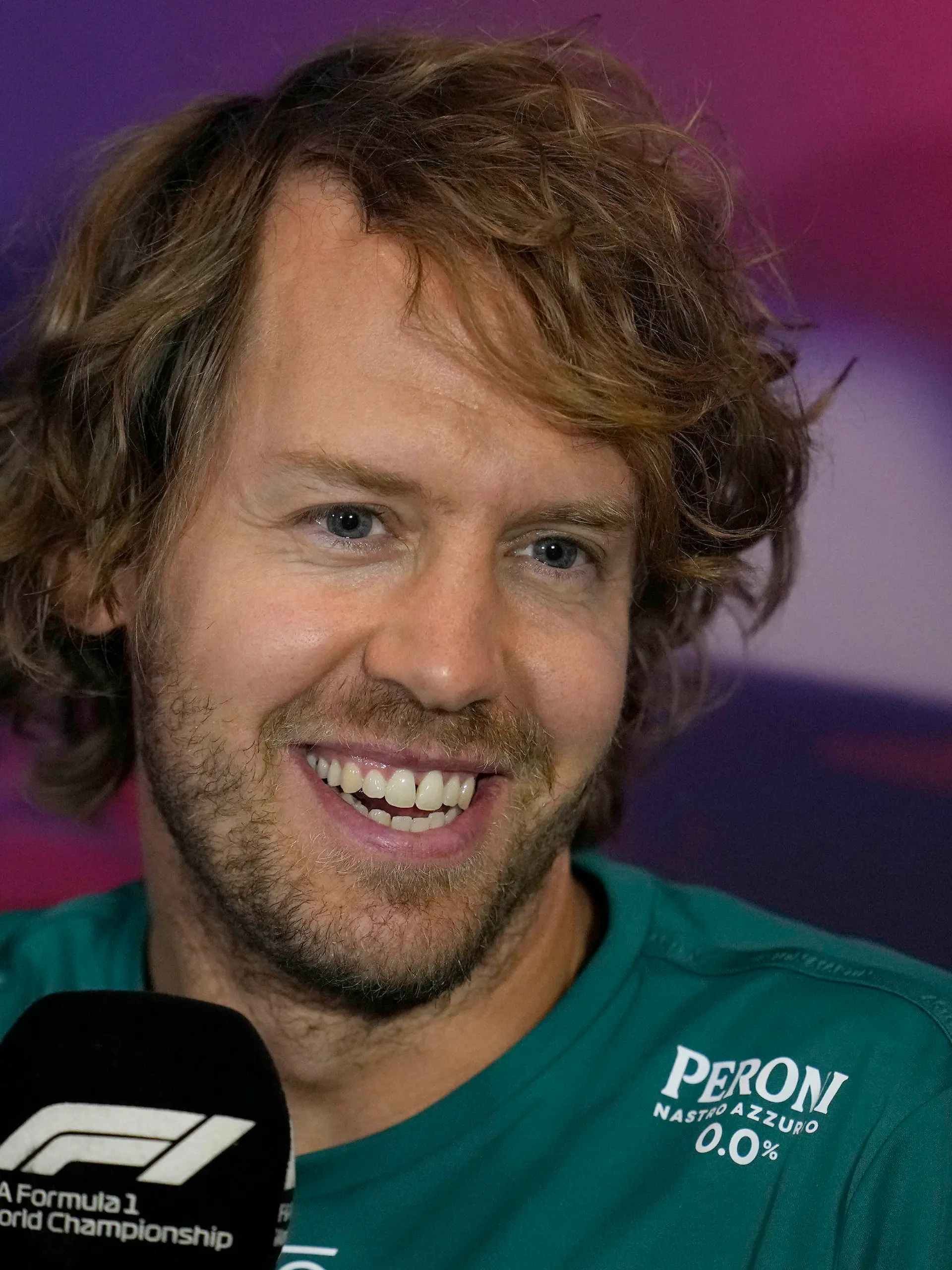 Aston Martin driver Sebastian Vettel of Germany smiles during a press conference at the Silverstone race track in Silverstone, Thursday, June 30, 2022. The British F1 Grand Prix is held on Sunday July 3,2022. (AP Photo/Matt Dunham)