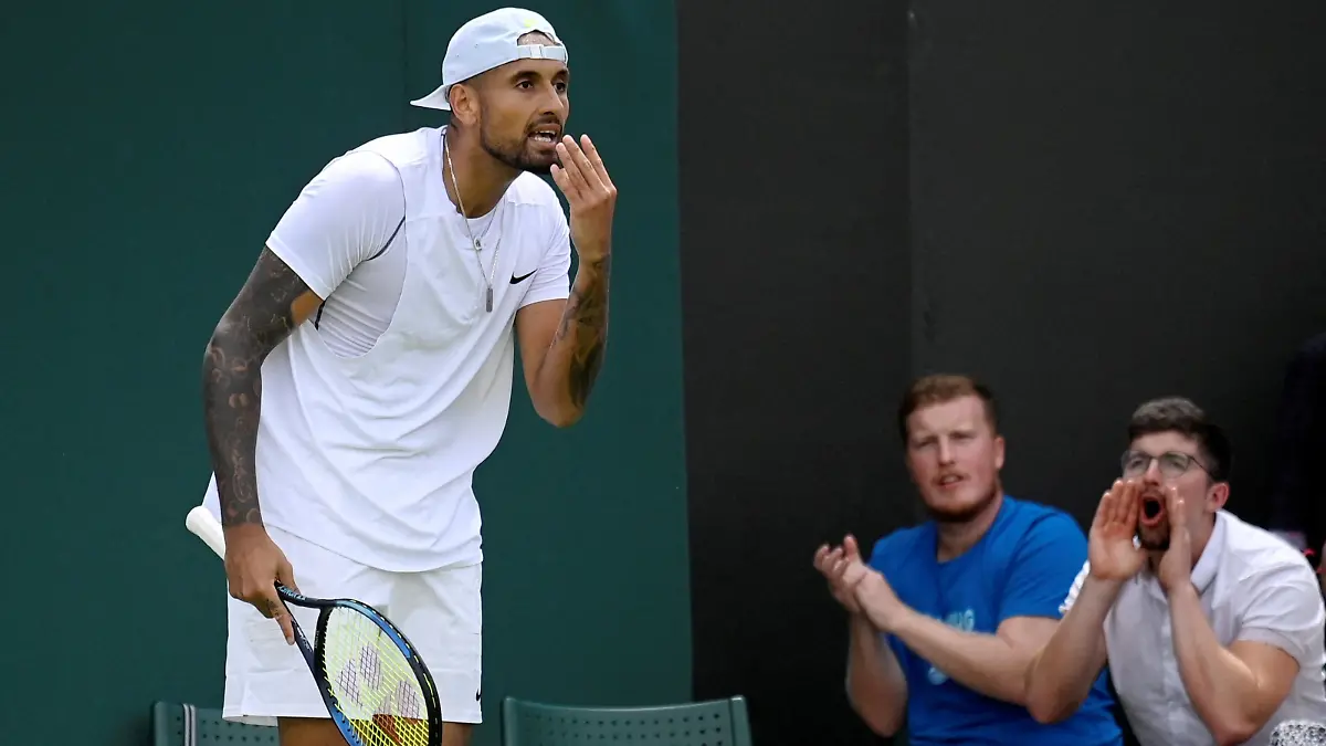 Tennis - Wimbledon - All England Lawn Tennis and Croquet Club, London, Britain - June 28, 2022 Australia's Nick Kyrgios reacts during his first round match against Britain's Paul Jubb REUTERS/Toby Melville TPX IMAGES OF THE DAY