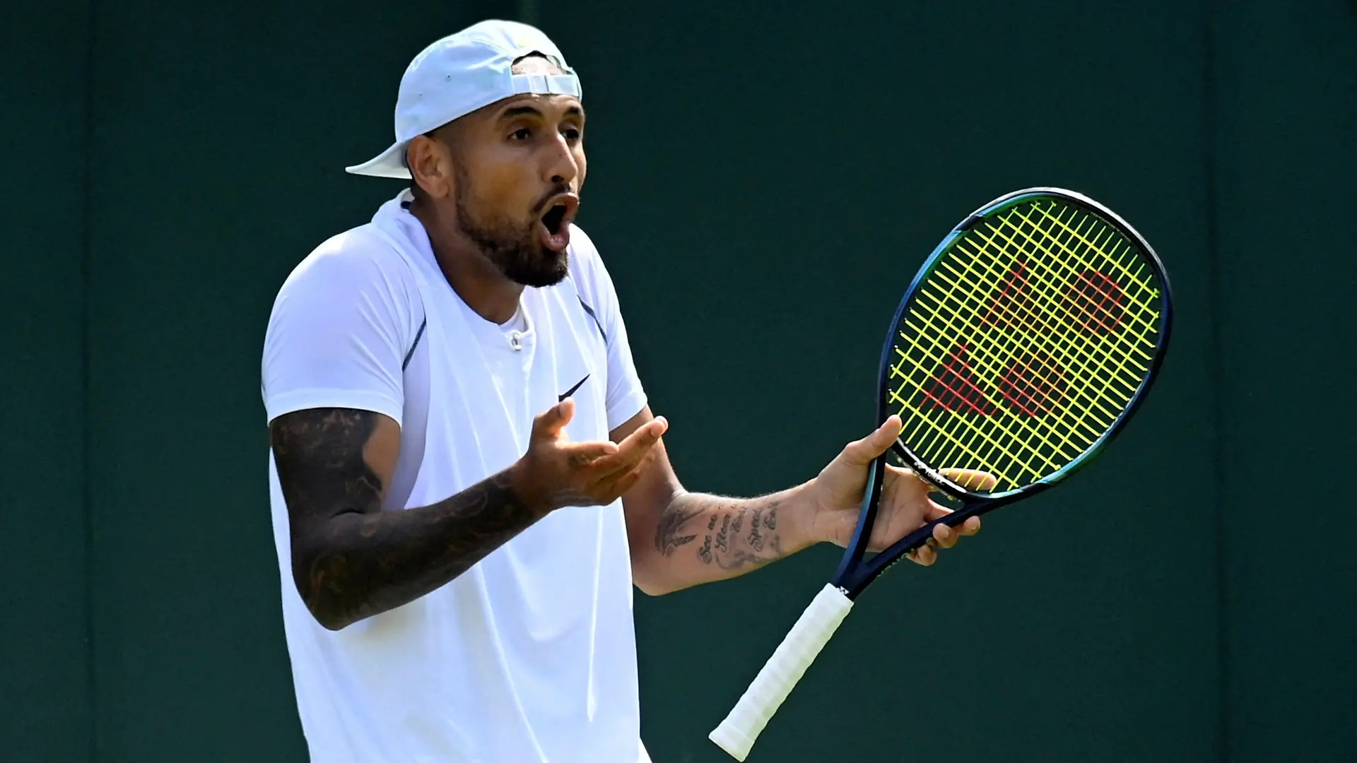 Tennis - Wimbledon - All England Lawn Tennis and Croquet Club, London, Britain - June 28, 2022 Australia's Nick Kyrgios in action during his first round match against Britain's Paul Jubb REUTERS/Toby Melville     TPX IMAGES OF THE DAY