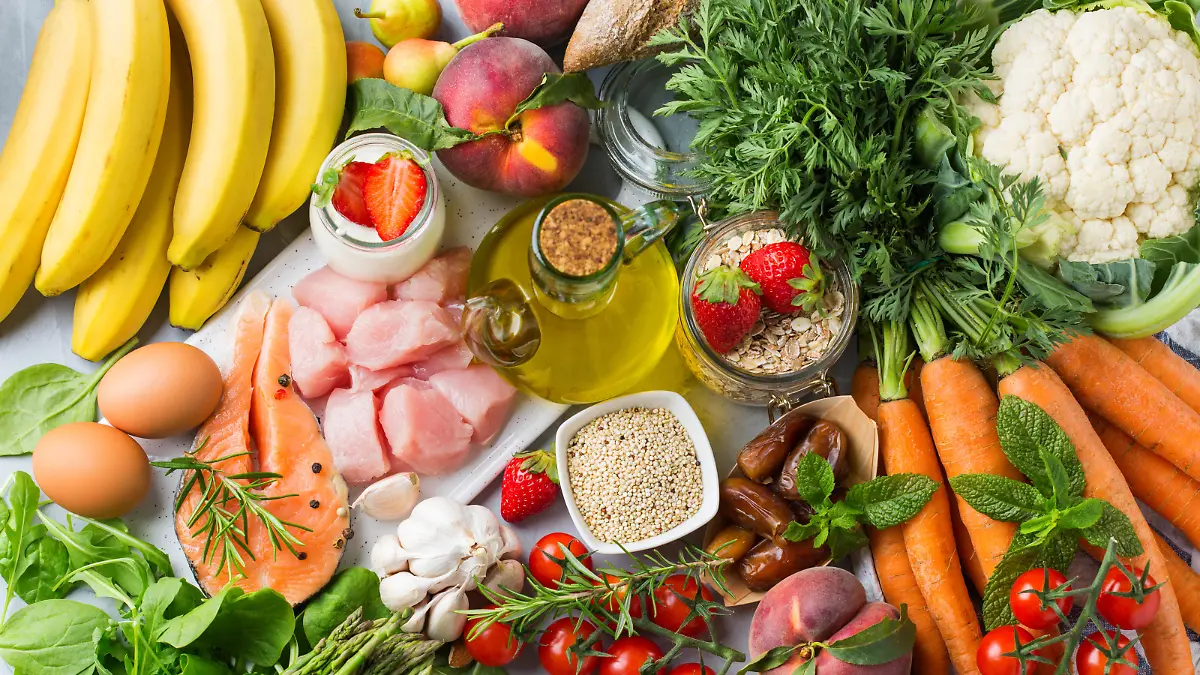 Balanced nutrition concept for DASH clean eating flexitarian mediterranean diet to stop hypertension and low blood pressure. Assortment of healthy food ingredients for cooking on a kitchen table.