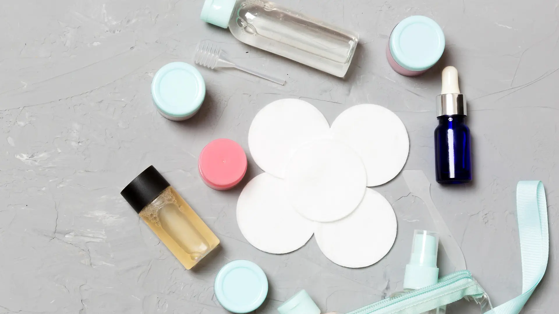 Set of travel size cosmetic bottles on gray background. Flat lay of cream jars. Top view of bodycare style concept. xkwx bottles, cosmetic, bag, accessory, body, concept, cream, travel, sized, spray, lotion, vacation, set, size, cosmetics, flat, beauty, container, object, plastic, product, background, care, clean, clear, collection, gel, hygiene, liquid, shampoo, balm, bath, color, conditioner, empty, health, hotel, kit, moisturizer, personal, seasonal, shower, small, toiletry, jar, cosmetic spatula, toner, bodycare, style, gray