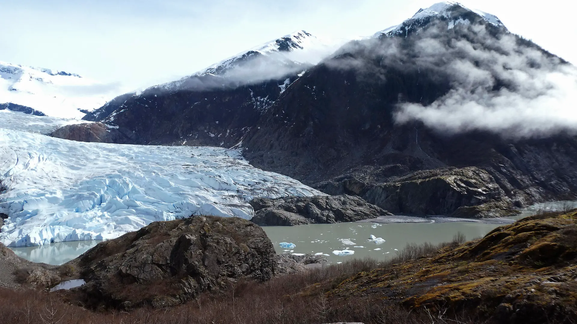 FILE - Chunks of ice float in Mendenhall Lake in front of the Mendenhall Glacier on April 29, 2023, in Juneau, Alaska. An Alaska man inadvertently filmed his own drowning on the glacial lake with a GoPro camera mounted on his helmet, but authorities who recovered the camera have not yet found his body, officials said Tuesday, July 18, 2023. (AP Photo/Becky Bohrer, File)