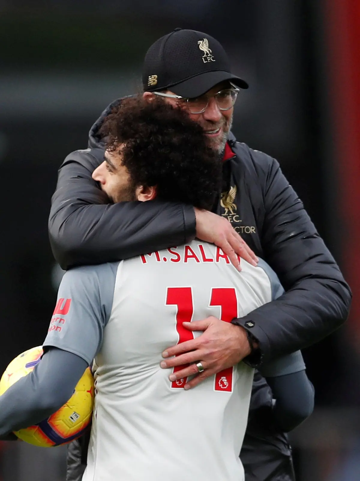 Soccer Football - Premier League - AFC Bournemouth v Liverpool - Vitality Stadium, Bournemouth, Britain - December 8, 2018  Liverpool manager Juergen Klopp celebrates after the match with Mohamed Salah   Action Images via Reuters/Matthew Childs  EDITORIAL USE ONLY. No use with unauthorized audio, video, data, fixture lists, club/league logos or "live" services. Online in-match use limited to 75 images, no video emulation. No use in betting, games or single club/league/player publications.  Please contact your account representative for further details.