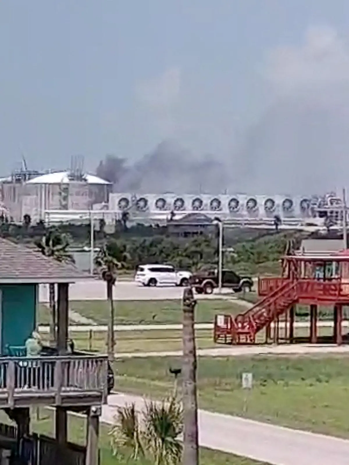 FILE PHOTO: Smoke billows from the Freeport LNG plant in Quintana, Texas, U.S., June 8, 2022, in this still image obtained from a social media video on June 9, 2022.  Courtesy of Maribel Hill/via REUTERS    THIS IMAGE HAS BEEN SUPPLIED BY A THIRD PARTY. MANDATORY CREDIT. NO RESALES. NO ARCHIVES/File Photo/File Photo/File Photo