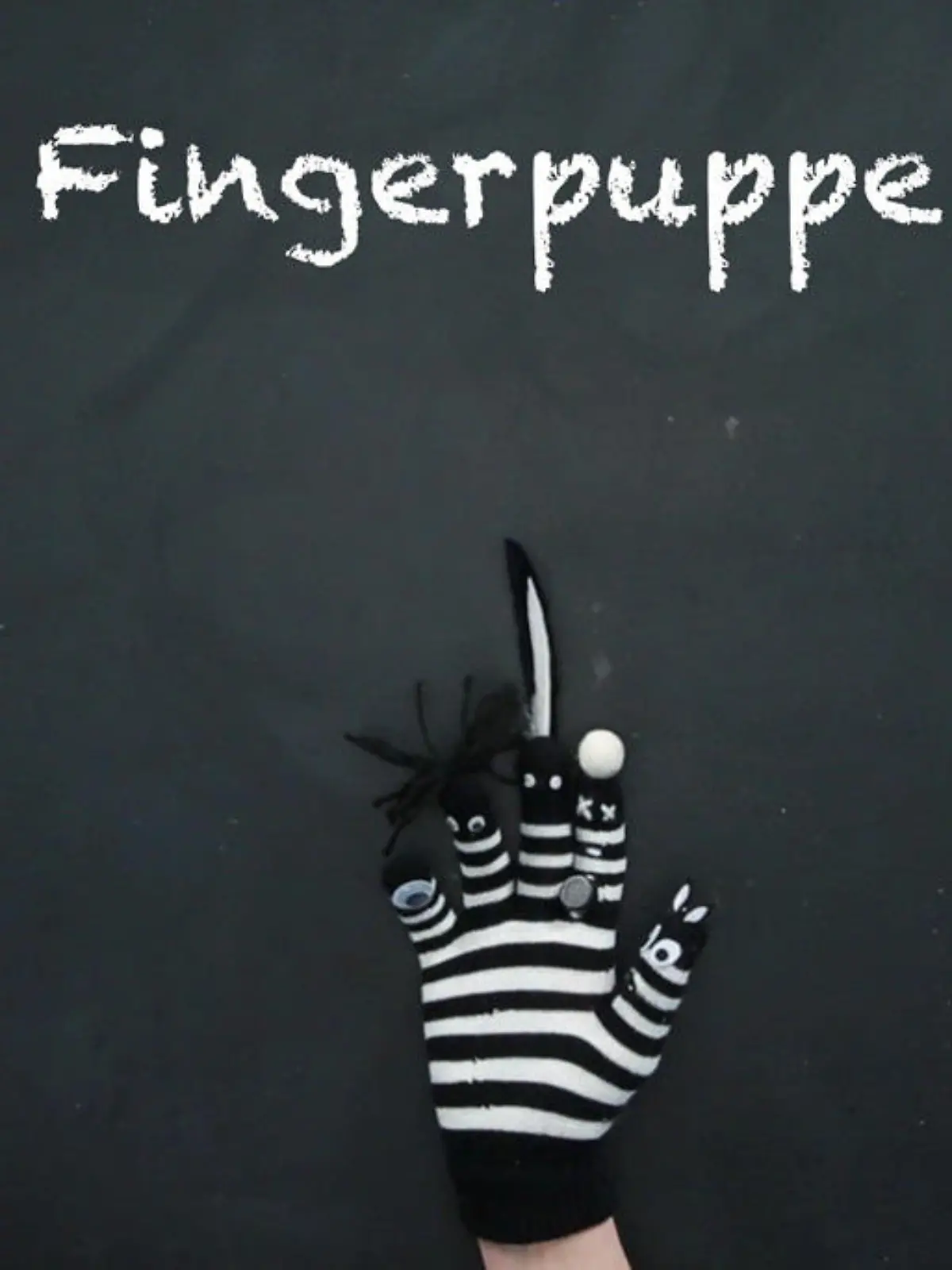 Bild zu: "Fingerpuppe basteln aus altem Handschuh"