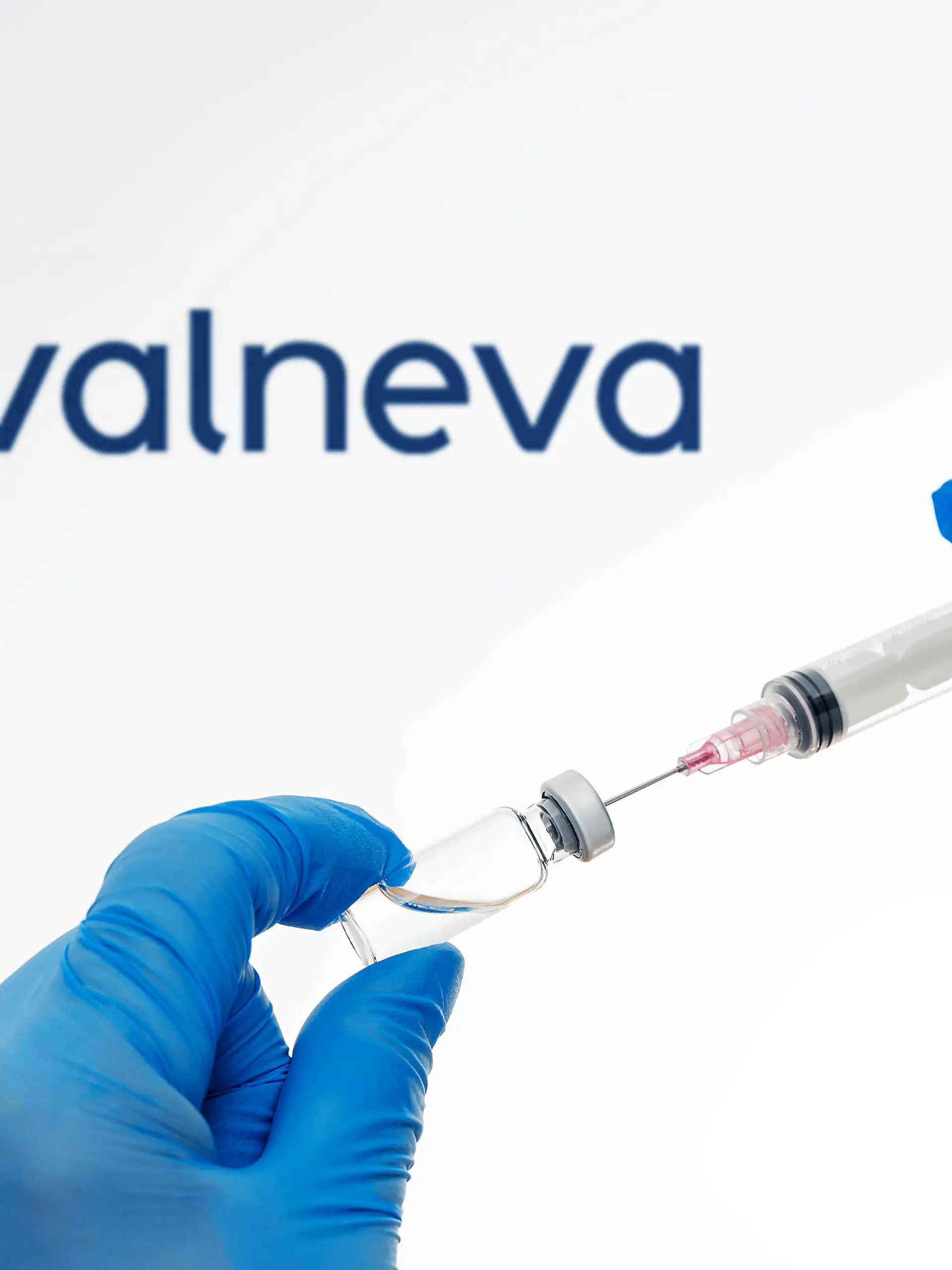26 February 2022: Valneva Covid 19 coronavirus vaccination inscription - New Omikron vaccine Valneva Covid-19 dead vaccine VLA2001 doctor draws a syringe on symbol photo PHOTOMONTAGE *** Valneva Covid 19 Coronavirus Impfung Aufschrift - Neuer Omikron Impfstoff Valneva Covid-19 Totimpfstoff VLA2001 Arzt zieht eine Spritze auf Symbolfoto FOTOMONTAGE 