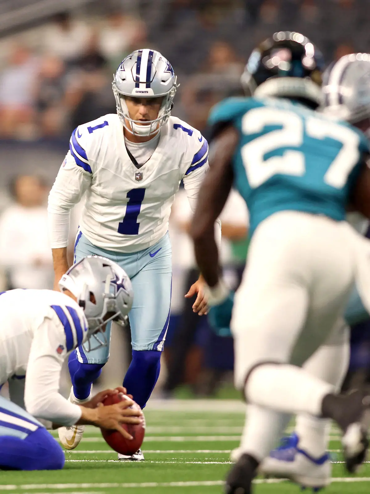 Aug 12, 2023; Arlington, Texas, USA; Dallas Cowboys place kicker Brandon Aubrey (1) kicks an extra point in the fourth quarter against the Jacksonville Jaguars at AT&T Stadium. Mandatory Credit: Tim Heitman-USA TODAY Sports