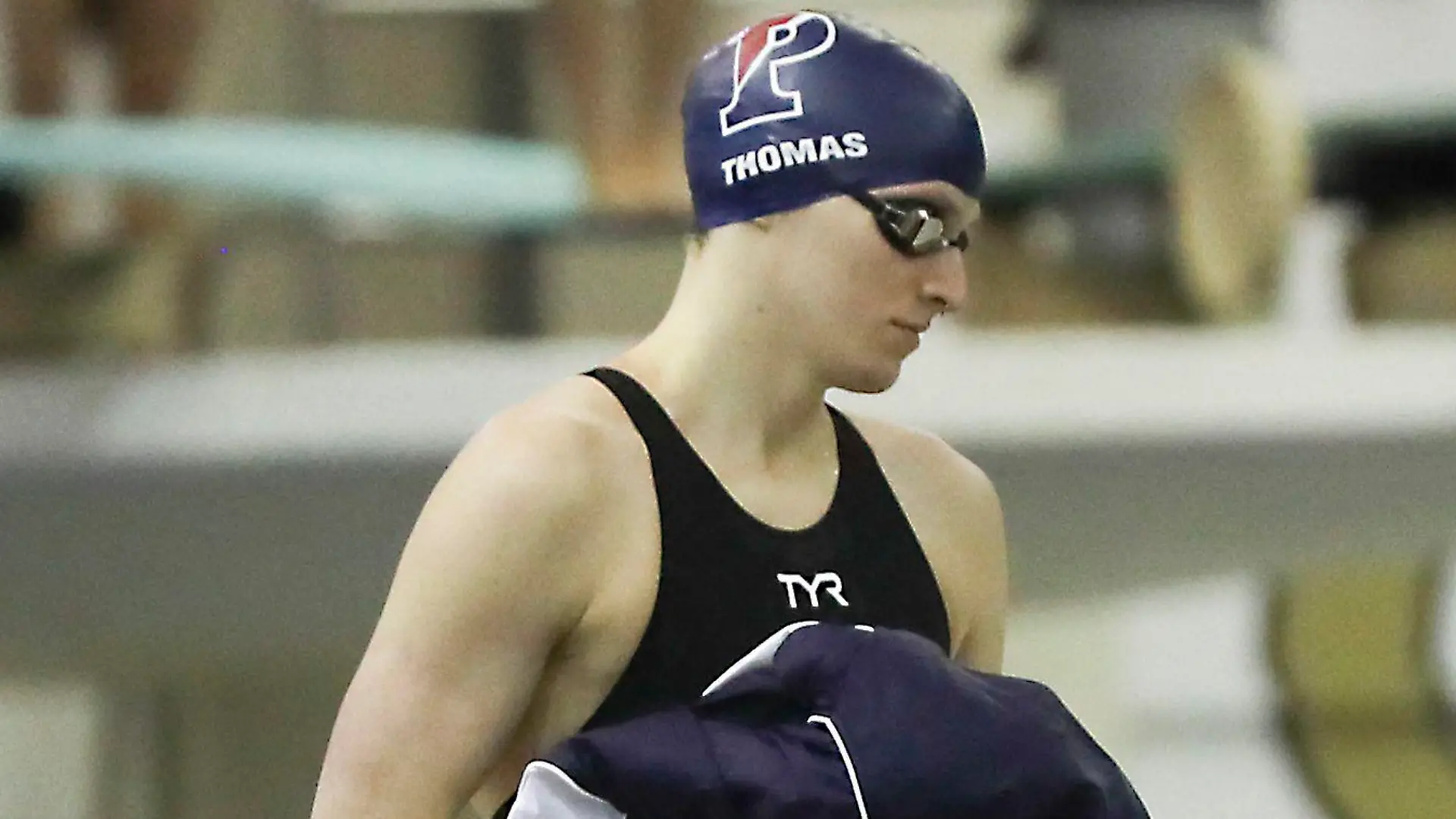 Penn swimmer Lia Thomas approaches the starting block in the preliminary round of the 200-yard freestyle race at the NCAA women's swimming and diving championship inside Georgia Techâs McAuley Aquatic Center in Atlanta on Friday, March 18, 2022. Photo by The Philadelphia Inquirer/TNS/ABACAPRESS.COM