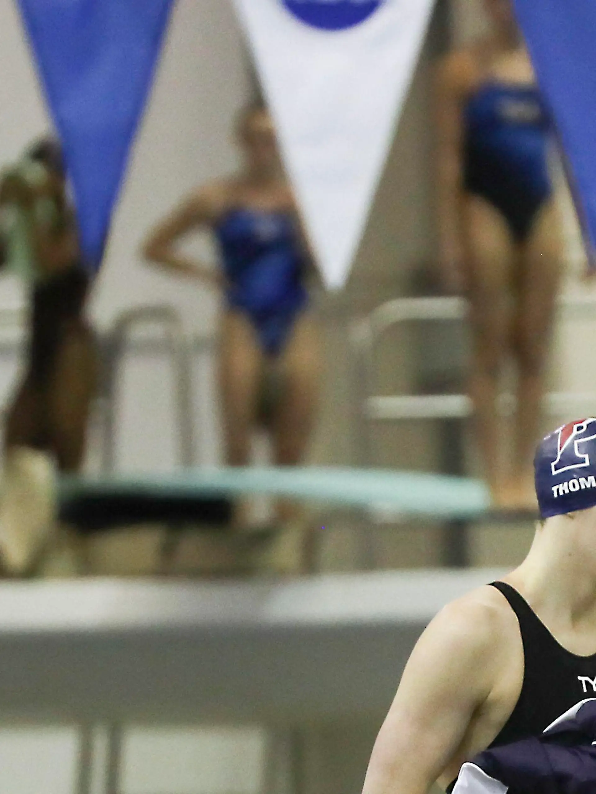 Penn swimmer Lia Thomas approaches the starting block in the preliminary round of the 200-yard freestyle race at the NCAA women's swimming and diving championship inside Georgia Techâs McAuley Aquatic Center in Atlanta on Friday, March 18, 2022. Photo by The Philadelphia Inquirer/TNS/ABACAPRESS.COM
