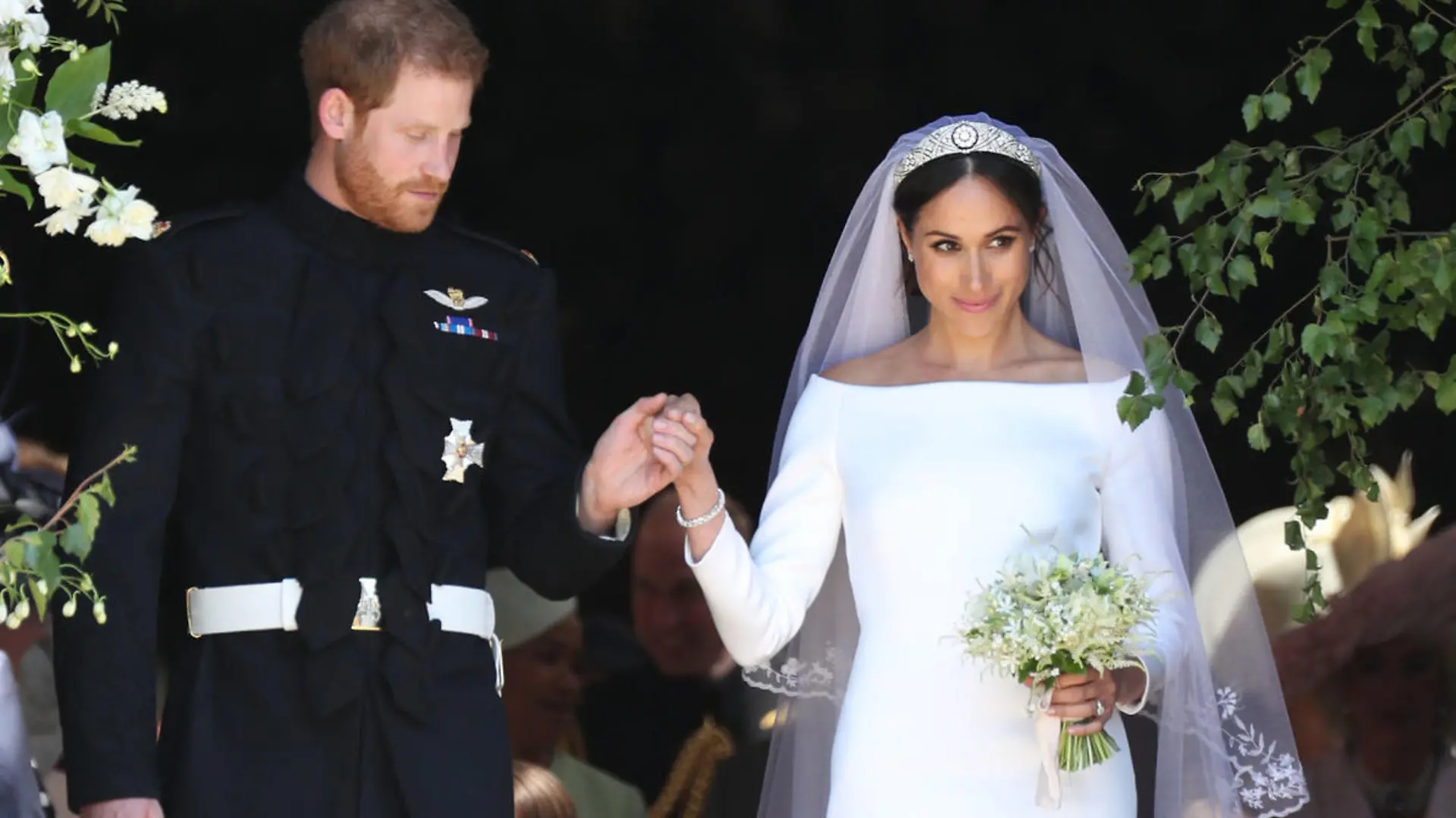 19.05.2018, Großbritannien, Windsor: Prinz Harry und seine Frau Meghan verlassen nach der Trauung die St.-Georgs-Kapelle. Prinz Harry of Wales hat Meghan Markle geheiratet. Foto: Jane Barlow/PA Wire/dpa +++ dpa-Bildfunk +++