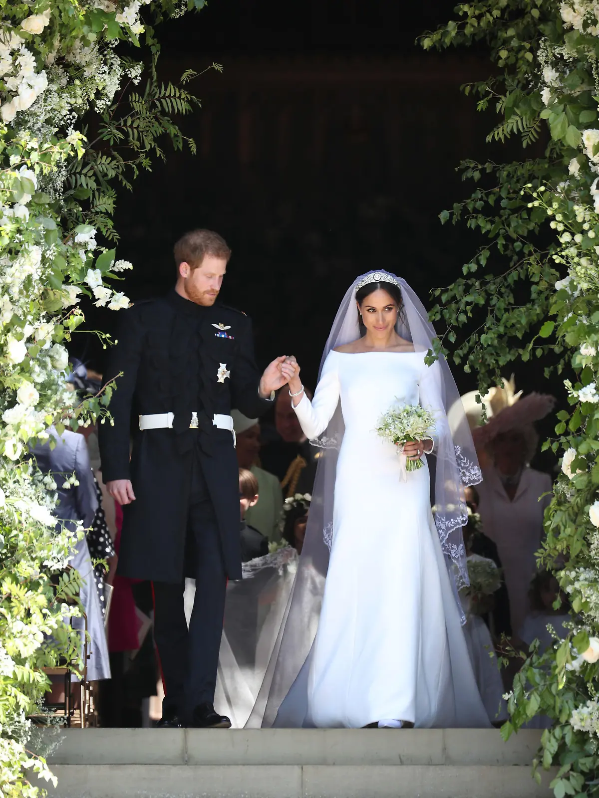 19.05.2018, Großbritannien, Windsor: Prinz Harry und seine Frau Meghan verlassen nach der Trauung die St.-Georgs-Kapelle. Prinz Harry of Wales hat Meghan Markle geheiratet. Foto: Jane Barlow/PA Wire/dpa +++ dpa-Bildfunk +++