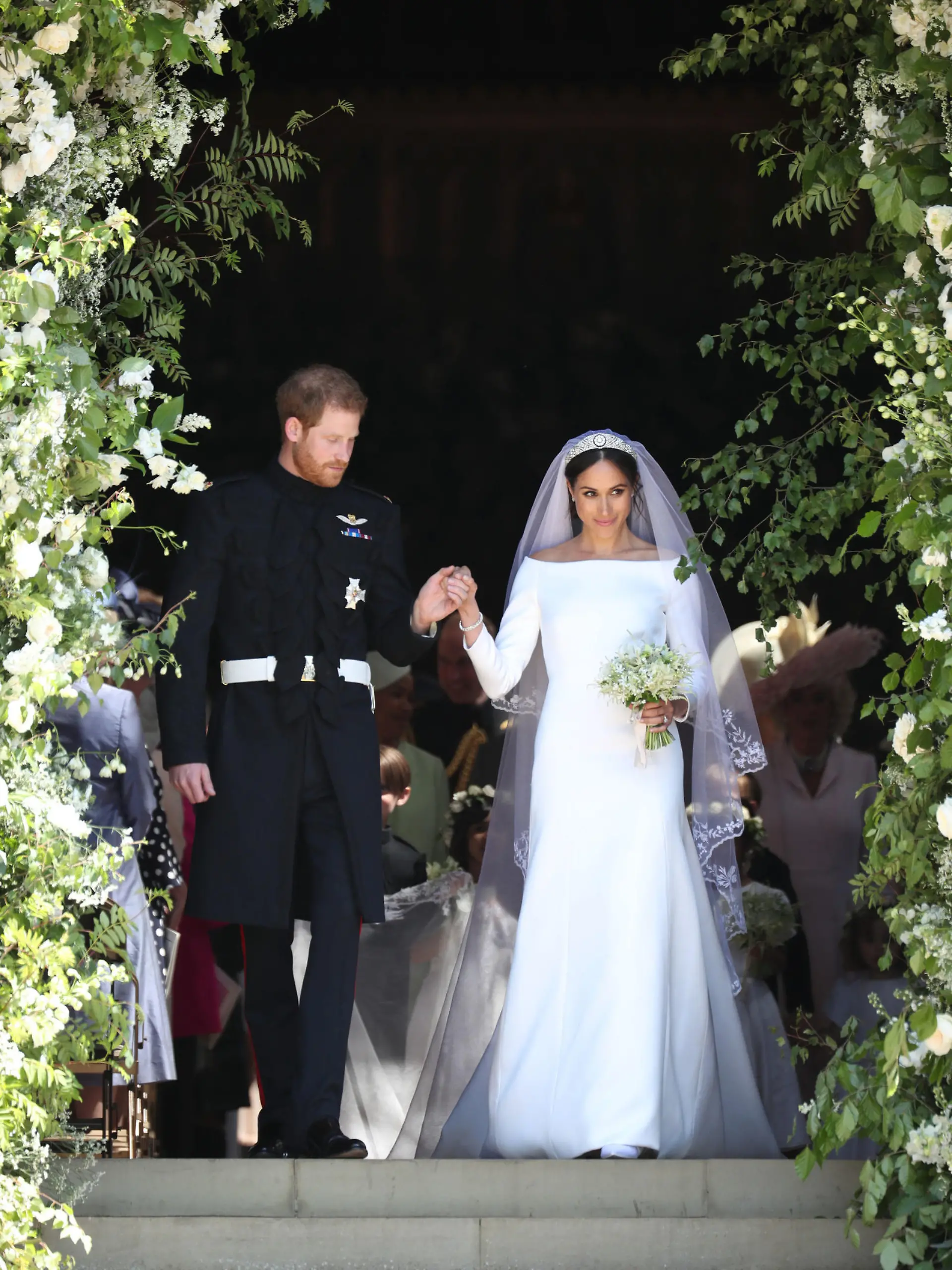 19.05.2018, Großbritannien, Windsor: Prinz Harry und seine Frau Meghan verlassen nach der Trauung die St.-Georgs-Kapelle. Prinz Harry of Wales hat Meghan Markle geheiratet. Foto: Jane Barlow/PA Wire/dpa +++ dpa-Bildfunk +++