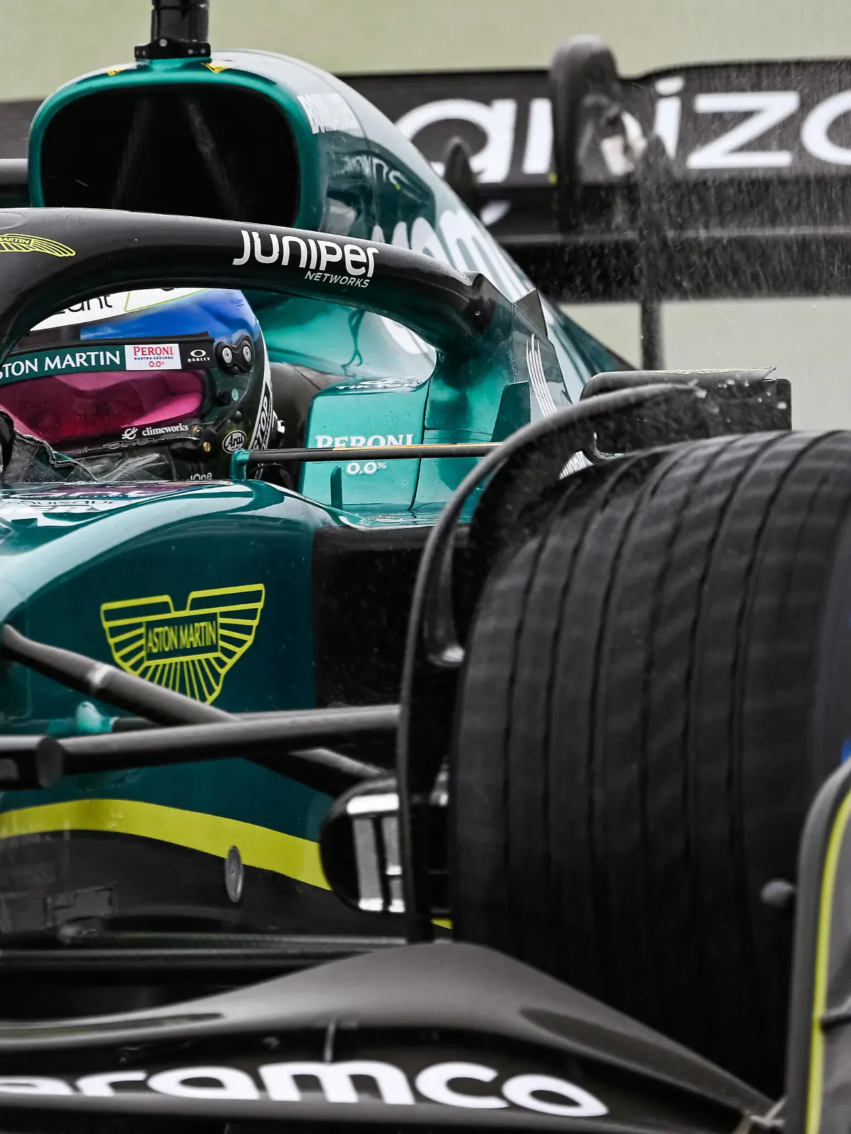 Jun 18, 2022; Montreal, Quebec, CAN; Aston Martin driver Sebastian Vettel of Germany races in the senna turn during the qualifying session at Circuit Gilles Villeneuve. Mandatory Credit: David Kirouac-USA TODAY Sports