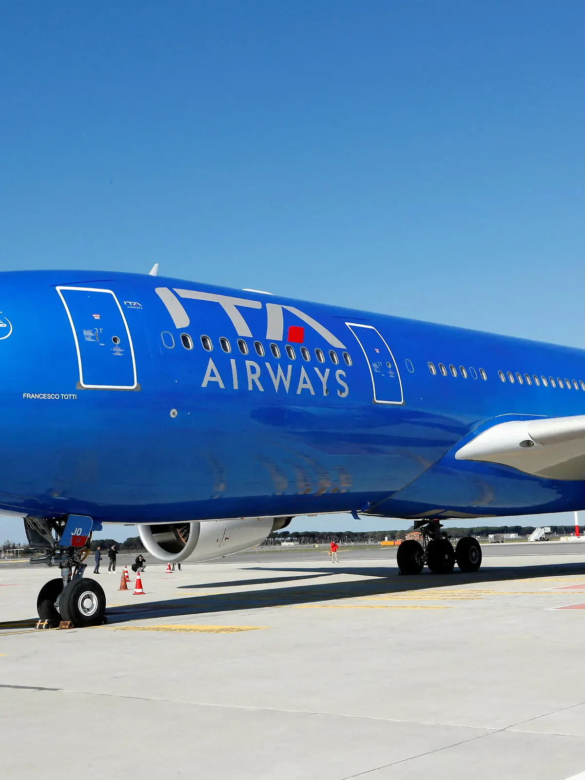 FILE PHOTO: A new state-owned Italian carrier Italia Trasporto Aereo plane with the new blue livery is seen at Fiumicino airport before a news conference to present the aircraft's new fleet, in Rome, Italy, March 1, 2022. REUTERS/Remo Casilli/File Photo