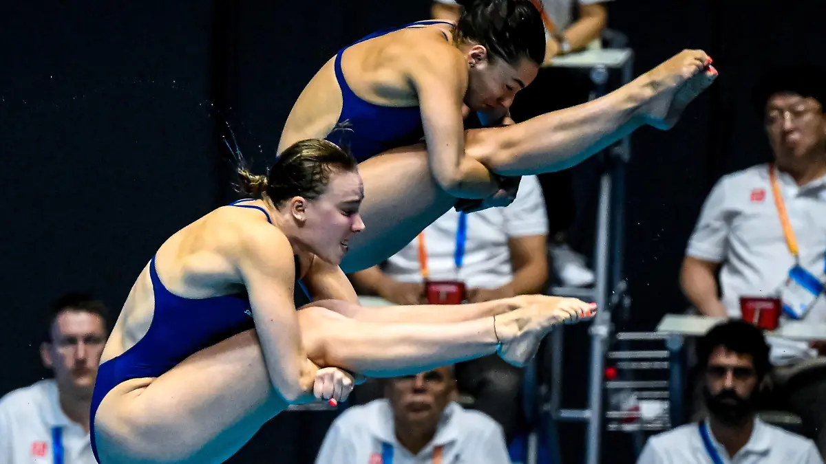 Yasmin Harper of Great Britain, Scarlett Mew Jensen of Great Britain compete in the 3m Springboard Synchro Women Preliminary during the 20th World Aquatics Championships at the Fukuoka Prefectural Pool in Fukuoka Japan, July 17th, 2023. GiorgioXScala