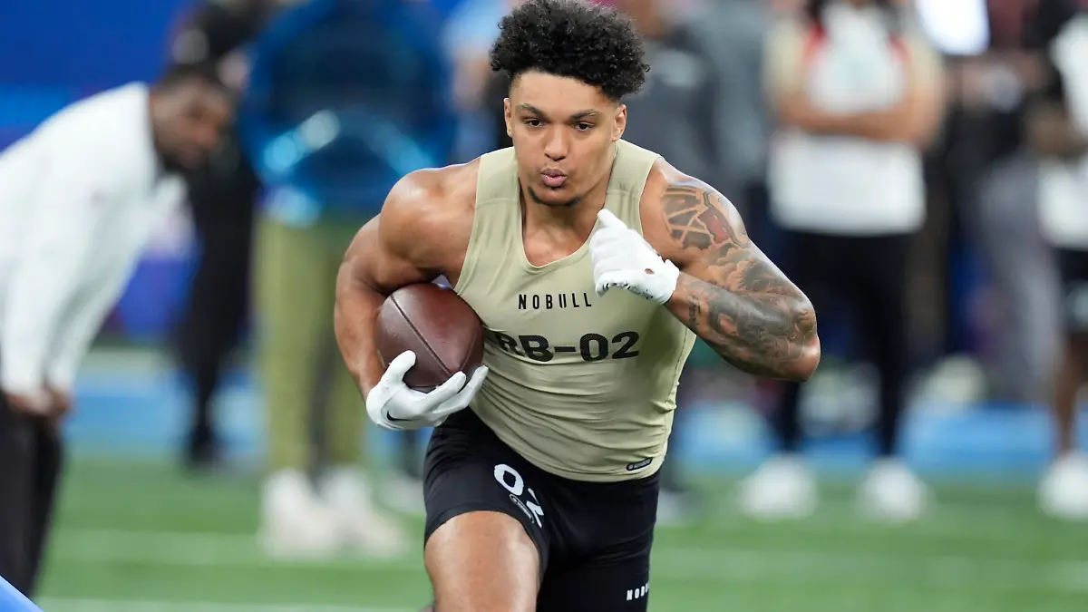 Wisconsin running back Braelon Allen runs a drill at the NFL football scouting combine, Saturday, March 2, 2024, in Indianapolis. (AP Photo/Darron Cummings)