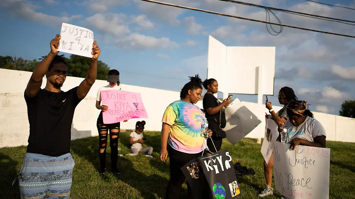 Friends, family and activists gather Friday, Aug. 25, 2023, in Columbus, Ohio, to protest the shooting of 21-year-old Ta'Kiya Young, who was shot and killed a day earlier by Blendon Township police outside an Ohio supermarket. Young was pregnant and due to give birth in November, according to her family. (Courtney Hergesheimer/The Columbus Dispatch via AP)