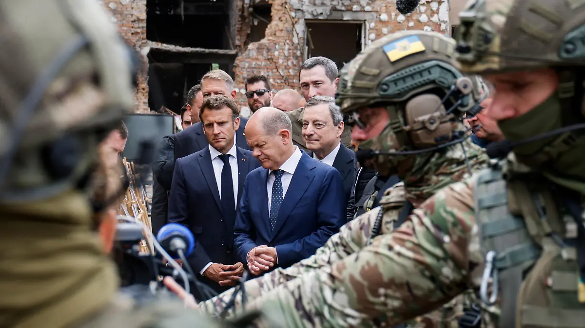 France's President Emmanuel Macron, Italian Prime Minister Mario Draghi, German Chancellor Olaf Scholz and Romanian President Klaus Iohannis visit Irpin, Ukraine June 16, 2022. Ludovic Marin/Pool via REUTERS