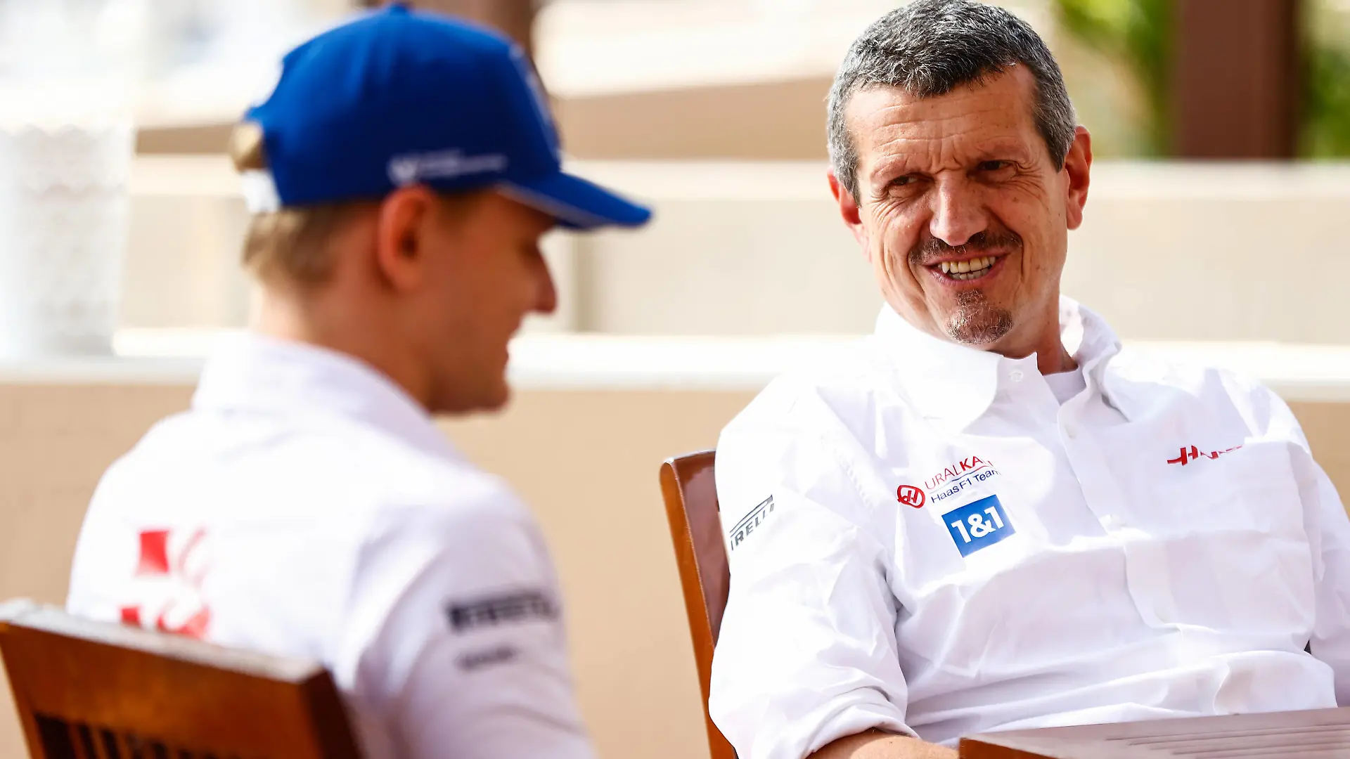 Formula 1 2021: Abu Dhabi GP YAS MARINA CIRCUIT, UNITED ARAB EMIRATES - DECEMBER 11: Guenther Steiner, Team Principal, Haas F1, and Mick Schumacher, Haas F1 during the Abu Dhabi GP at Yas Marina Circuit on Saturday December 11, 2021 in Abu Dhabi, United Arab Emirates. Photo by Andy Hone / LAT Images Images PUBLICATIONxINxGERxSUIxAUTxHUNxONLY GP2122_090043_ONZ1488