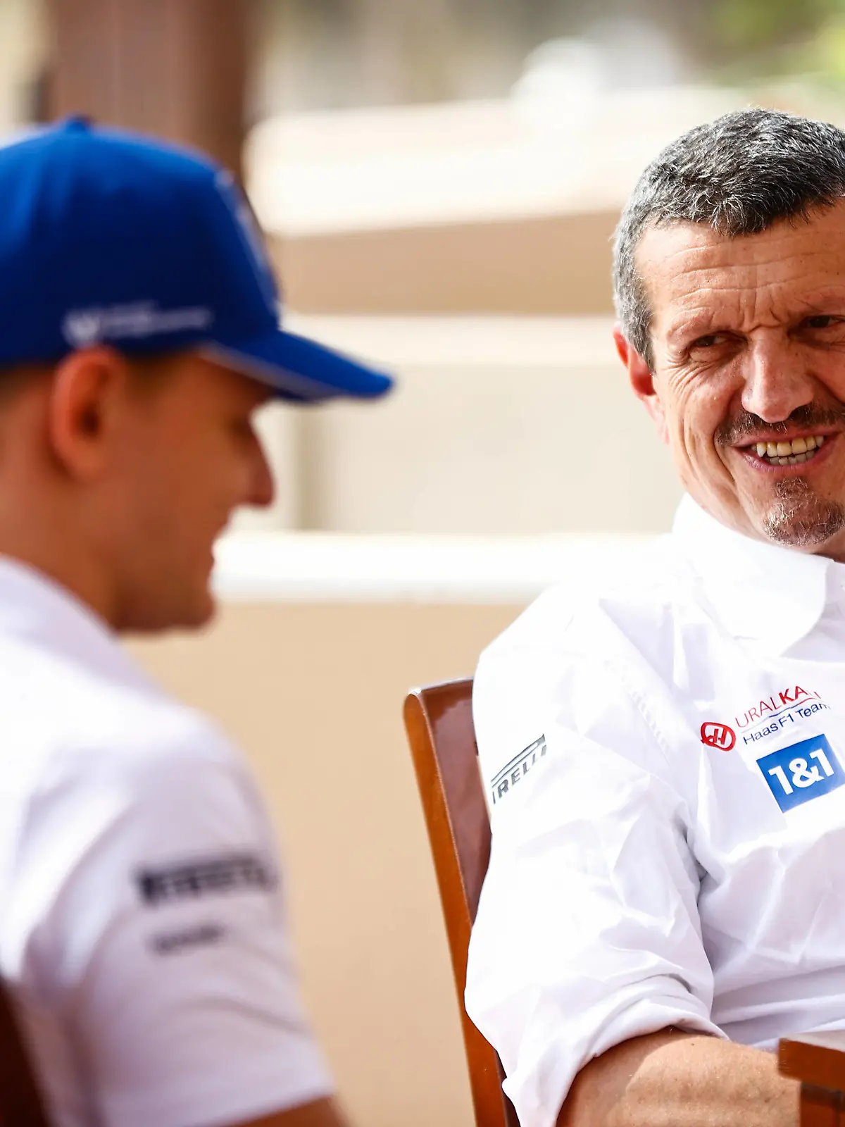 Formula 1 2021: Abu Dhabi GP YAS MARINA CIRCUIT, UNITED ARAB EMIRATES - DECEMBER 11: Guenther Steiner, Team Principal, Haas F1, and Mick Schumacher, Haas F1 during the Abu Dhabi GP at Yas Marina Circuit on Saturday December 11, 2021 in Abu Dhabi, United Arab Emirates. Photo by Andy Hone / LAT Images Images PUBLICATIONxINxGERxSUIxAUTxHUNxONLY GP2122_090043_ONZ1488 