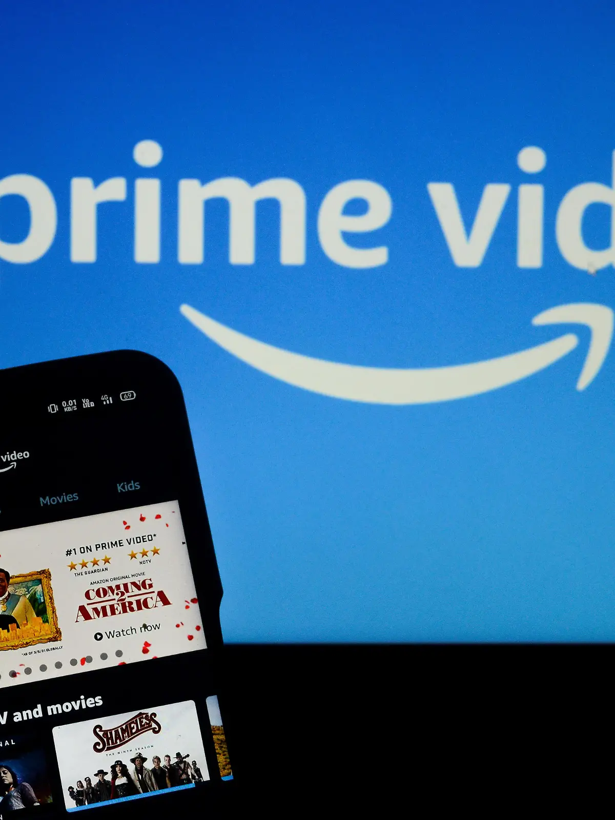 March 19, 2021, Kolkata, West Bengal, India: Illustration of Amazon prime video app on mobile device with Prime Video logo in background in Kolkata , India , on 19 March , 2021.Amazon prime video to produce first Indian bollywood film accoding to media reports. (Credit Image: Â© Debarchan Chatterjee/ZUMA Wire