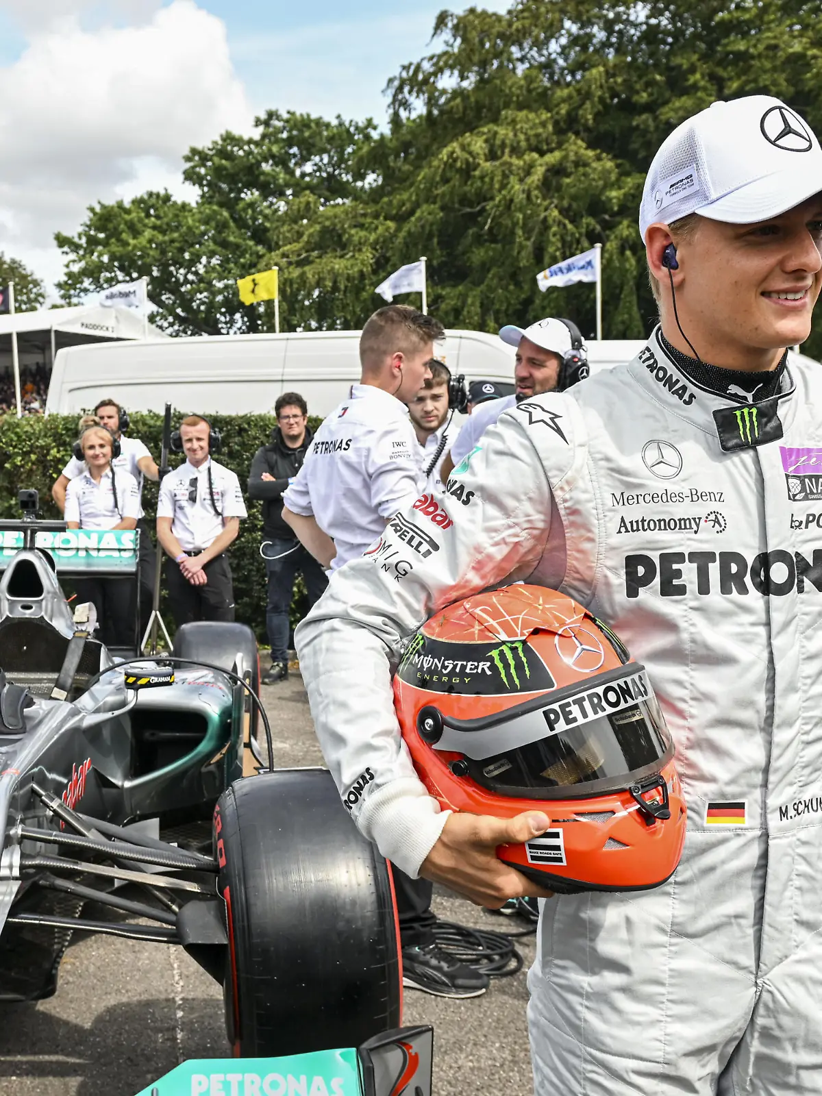 Goodwood Festival of Speed - 2023. EDITORIAL USE ONLY Mick Schumacher beside his father's Mercedes W02 which he drove during the 2011 Formula 1 season at the Goodwood Festival of Speed at Goodwood House in West Sussex. Picture date: Sunday June 16, 2023. This year, the event celebrates its 30th anniversary and takes place from June 13-16. Picture credit should read: John Nguyen/PA Wire. URN:73023273